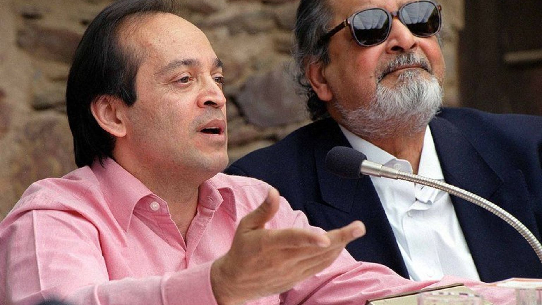 Indian author Vikram Seth (L) and British writer V.S. Naipaul in February 2002. Seth has been asked to return a $1.7-million advance he was paid by his publisher to write a sequel to his 1993 classic "A Suitable Boy", a report said.
