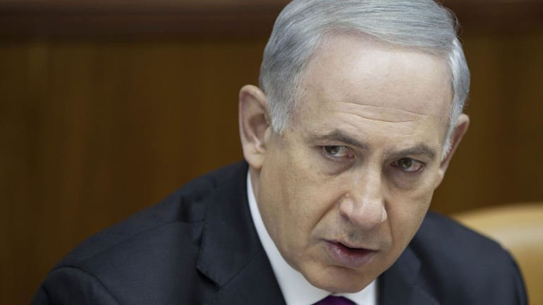 Israeli Prime Minister Benjamin Netanyahu attends the weekly cabinet meeting in Jerusalem on July 7, 2013. Netanyahu named as Israel's new ambassador to Washington Tuesday a peace process hawk seen as close to President Barack Obama's Republican opponents.