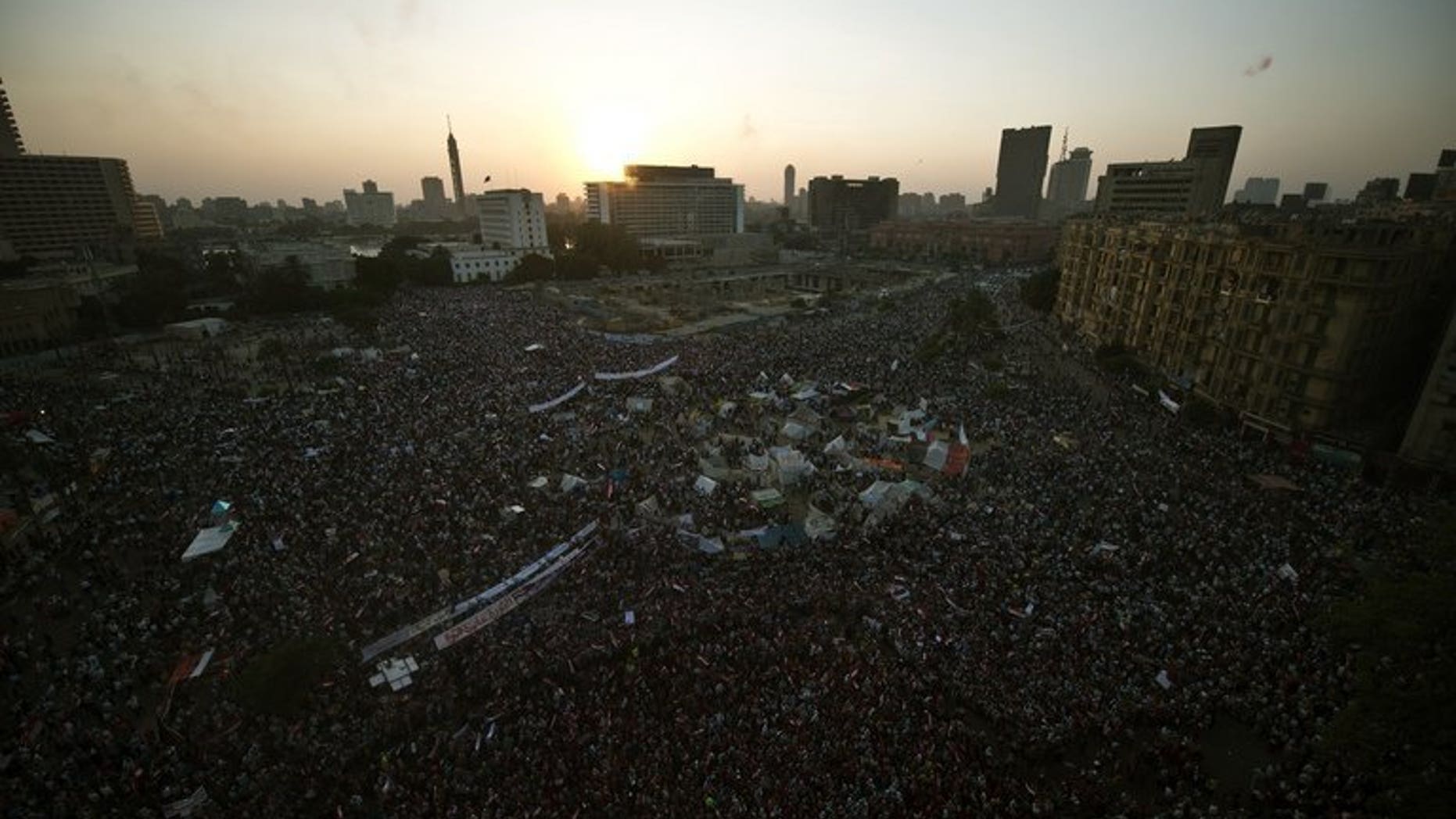 Thousands of Egyptians rally on July 7, 2013 in Cairo's Tahrir Square. Saudi Arabia said on Tuesday that it would give Egypt $5 billion (3.9 billion euro) in assistance for its economy, six days after the army toppled Islamist president Mohamed Morsi.