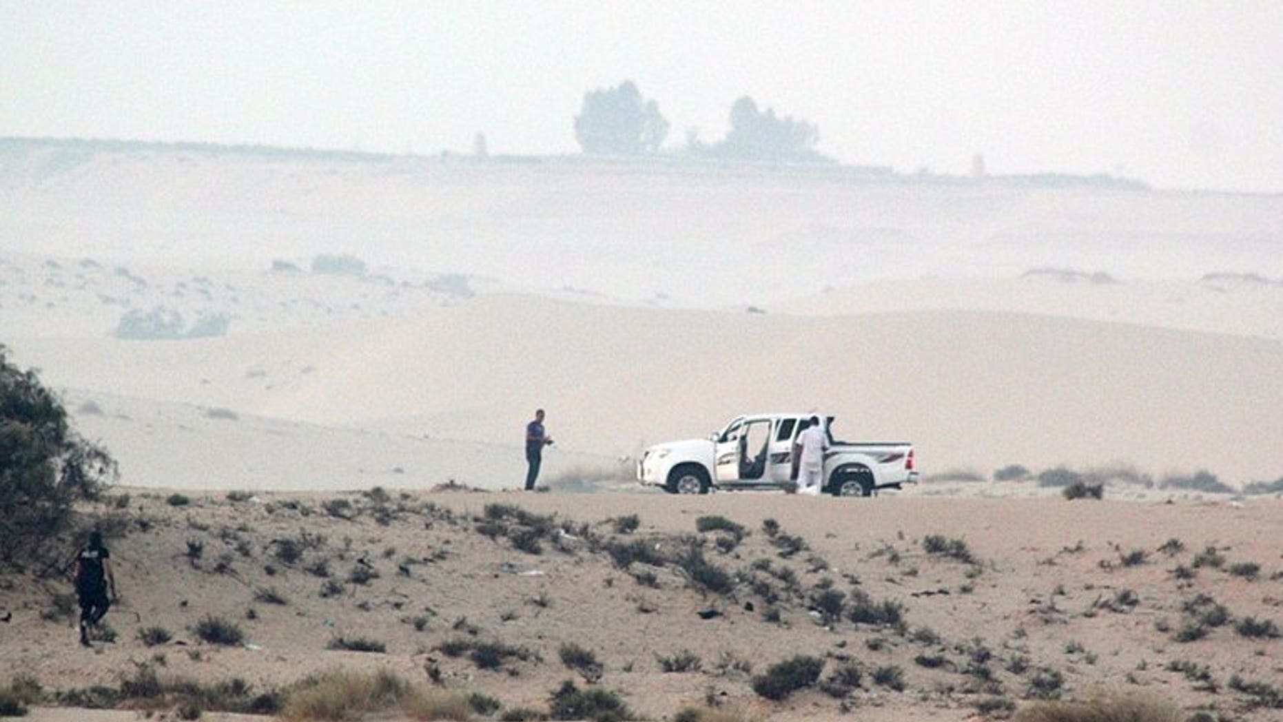 Egyptian security forces take position during an operation in the northern Sinai peninsula on August 8, 2012. Militants in Egypt's Sinai on Tuesday shelled a police base with mortar rounds and fired heavy machine guns in an ongoing attack, security officials told AFP.