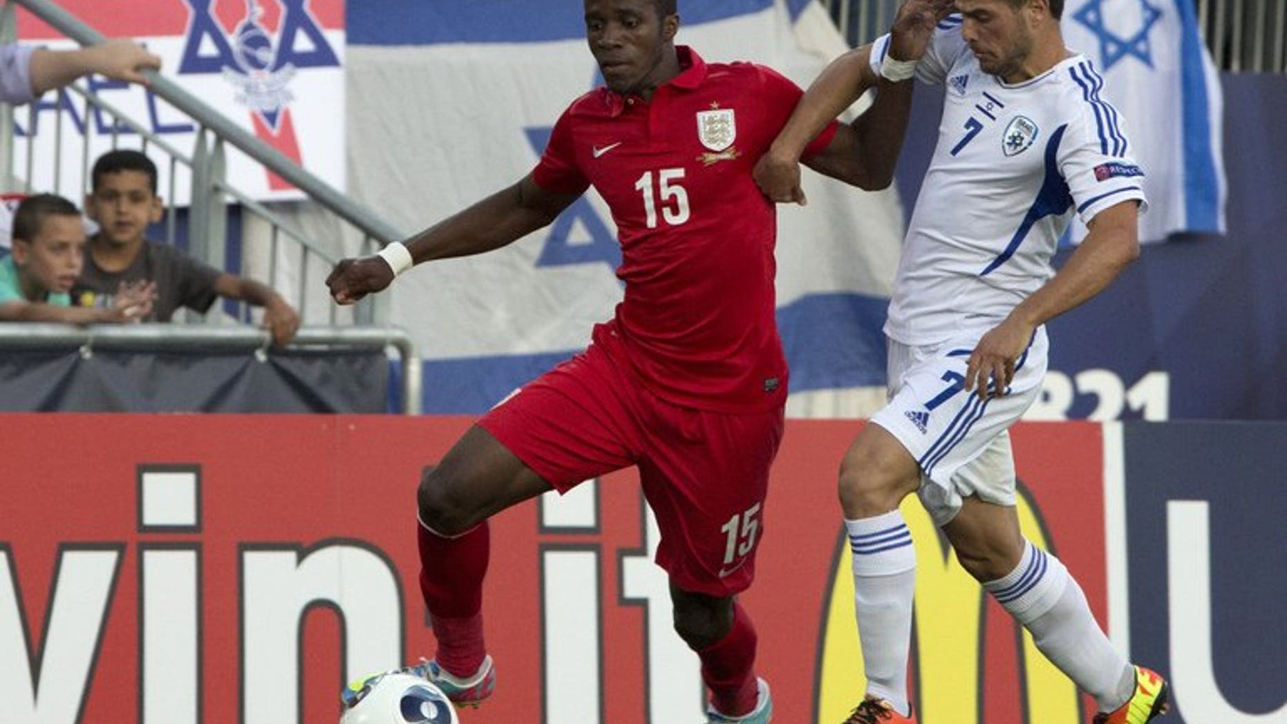 Wilfried Zaha (left) plays for England Under-21s against England in Jerusalem on June 11. David Moyes says new signing Zaha will join Manchester United's squad for their pre-season tour of east Asia and Australia.