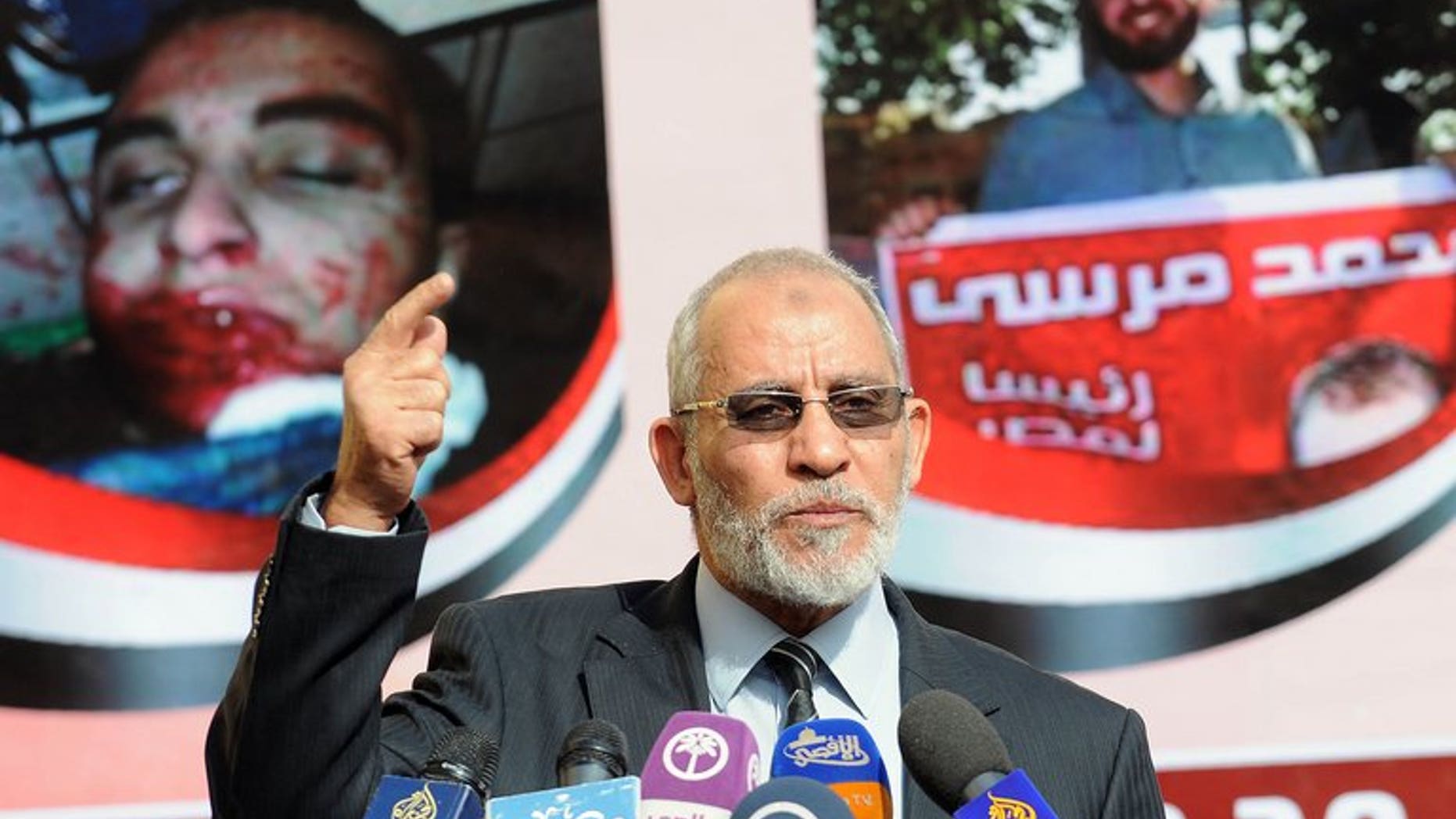 Mohammed Badie speaks during a press conference in Cairo last December. Egypt's public prosecutor on Wednesday ordered the arrest of Muslim Brotherhood supreme guide Mohammed Badie and other top leaders of the movement for inciting violence that left dozens dead outside the headquarters of an elite army unit, judicial sources said.