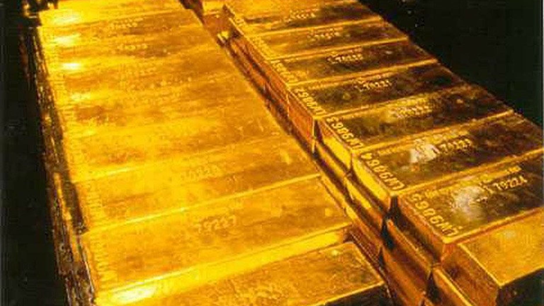 Gold bullion is stored inside a high-security vault in London, on September 28, 1999. Nepal police have seized 35 kilograms (77 pounds) of gold, smuggled over the border from China and bound for India, where demand for the precious metal is soaring.
