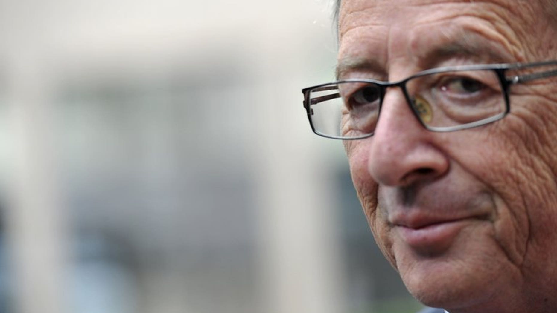 Luxembourg Prime Minister Jean-Claude Juncker, pictured June 27, 2013, said he would step down over a scandal involving the secret services, who were alleged to have indulged in a spate of misconduct on his watch.