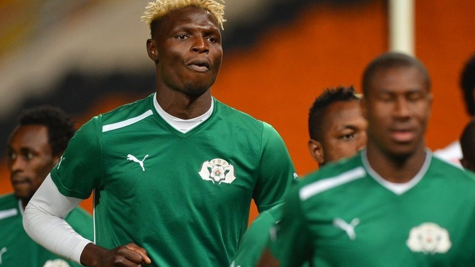 Burkina Faso striker Aristide Bance attends a training session at Soccer City in Soweto on February 9, 2013, on the eve of his side's 2013 Africa Cup of Nations final against Nigeria. Bance faces a race against time to be fit for the start of the new Bundesliga season with Augsburg next month after breaking his left arm in a friendly.