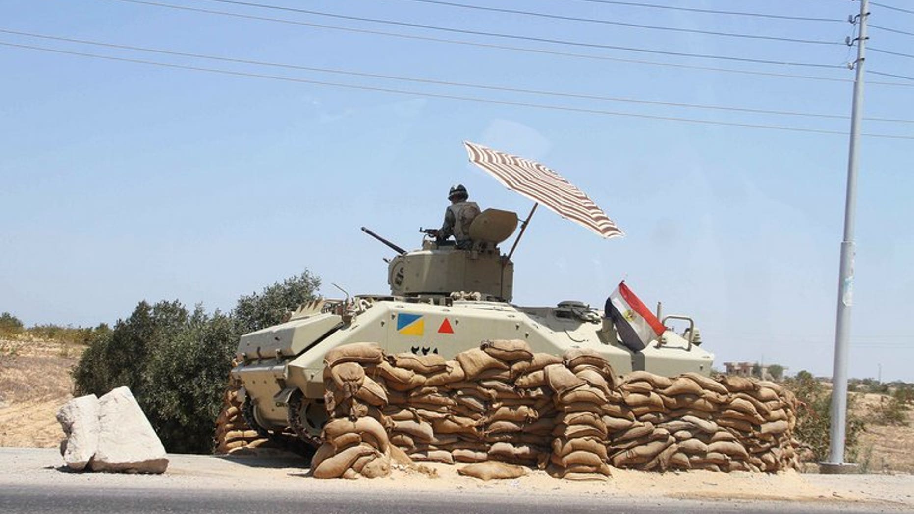 An Egyptian army vehicle in Sinai close to the Rafah border crossing. A Coptic Christian man was found decapitated on Thursday in Egypt's Sinai peninsula five days after he was kidnappped by gunmen, security officials and witnesses told AFP.