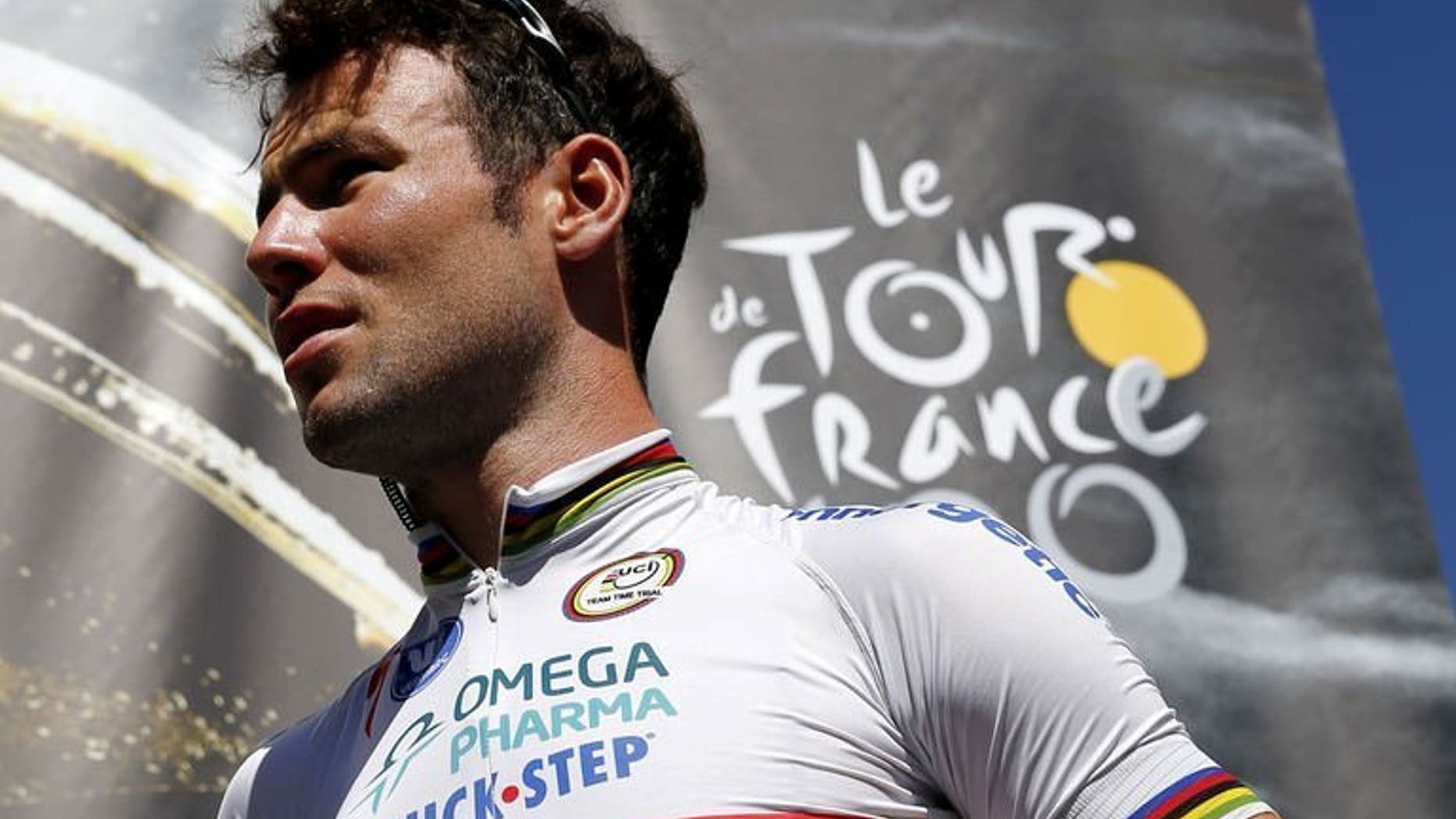 Britain's Mark Cavendish at a ceremony in Castres before the start of the eighth stage of the Tour de France on July 6, 2013 between Castres and Ax 3 Domaines, southwestern France. Cavendish is no longer welcome at the Boxmeer Criterium in the Netherlands, Dutch news agency ANP said on Thursday, reporting that race organisers had withdrawn his name from the list of starters.