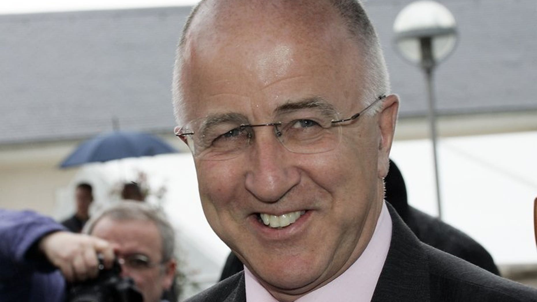 Britain's then-Europe minister Denis MacShane arrives at a foreign ministers' meeting in Luxembourg on April 15, 2005. MacShane is to be charged with false accounting over his expenses claims in parliament, prosecutors said Thursday.