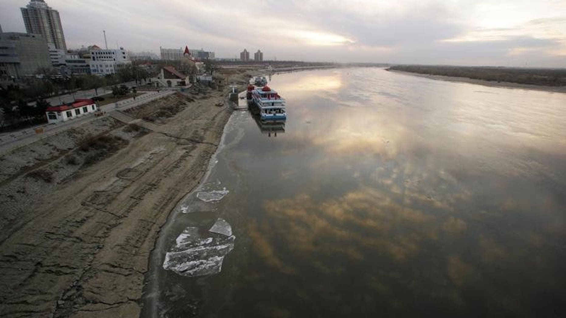 A view of the orthern Chinese city of Harbin, on November 24, 2005. A Chinese mother threw her newborn girl out of a apartment building window to the ground in Harbin, where she was run over by a car.