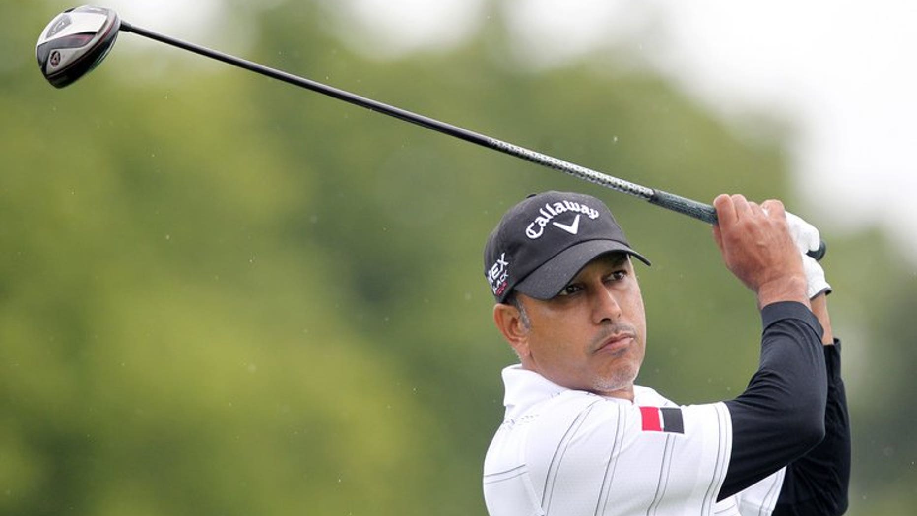 Jeev Milka Singh of India tees off at Carton House Golf Club, Maynooth, Ireland on June 27, 2013. Singh overcame the disappointment of having to miss the premiere of a film on the life of his legendary father in shooting an opening 67 at the Scottish Open.