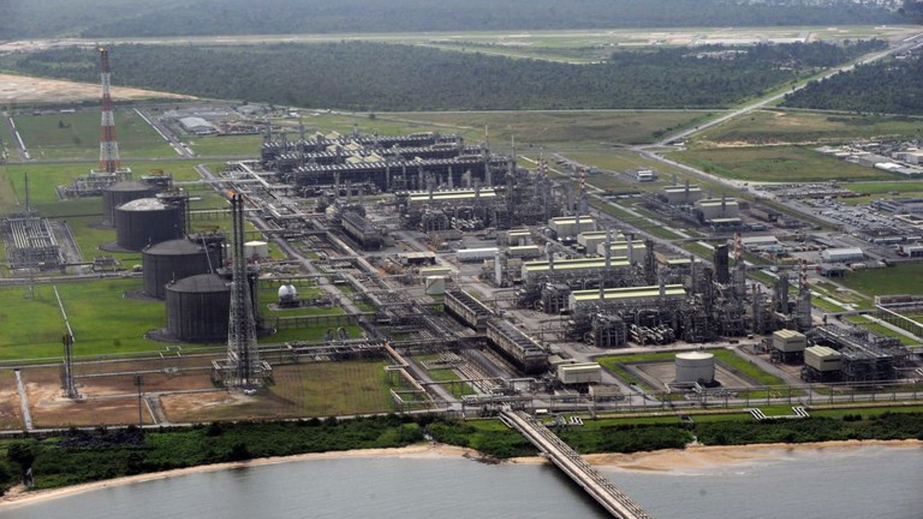 An aerial view of Nigeria Liquefied Natural Gas (NLNG) plant at Bonny Island in Rivers State on March 22, 2013. A Nigerian agency that has blockaded liquefied natural gas exports for three weeks, costing $475 million in revenue, agreed Friday to end its action after resolving a fees dispute, the company said.