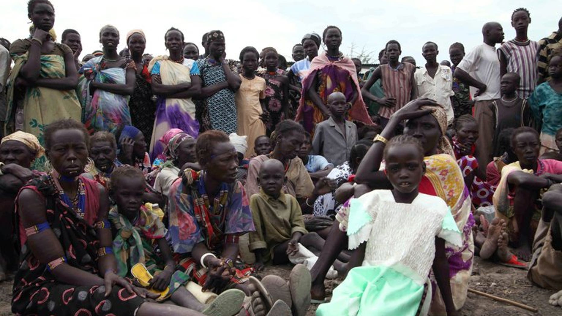 Internally displaced people wait for food distribution in Pibor, South Sudan's Jonglei state, on January 12, 2012. Fighting in South Sudan's Jonglei state, where tribal militia forces are reported to be marching on a rival group, risks spiralling into "outright ethnic conflict", European diplomats have warned.