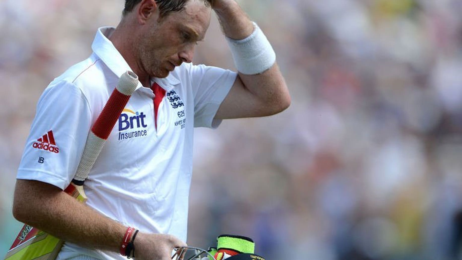 England's Ian Bell leaves the field after losing his wicket for 109 runs on the fourth day of the first Ashes cricket Test against Australia in Nottingham on July 13, 2013.