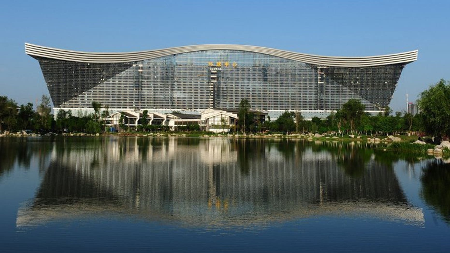 This picture taken on May 26, 2013 shows the "New Century Global Centre" building in Chengdu, in southwest China's Sichuan province. Boasting its own artificial sun and a floor area three times that of the Pentagon, the "world's largest building" has opened in southwest China to mixed reviews from its first visitors.