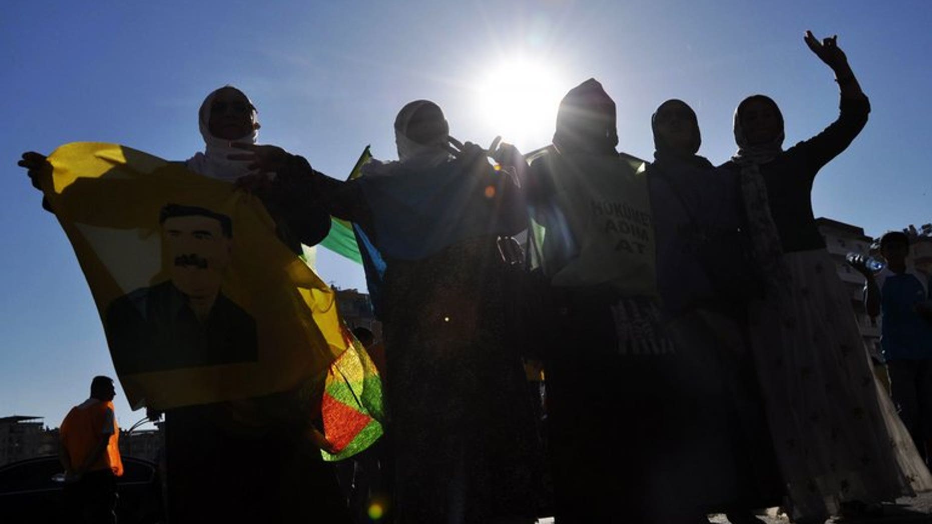 Kurds hold a rally in the Turkish city of Diyarbakir, on June 30, 2013. Turkey's highest court has allowed a Kurdish couple the right to name their daughter "Kurdistan", a word historically banned because it was considered seditious.