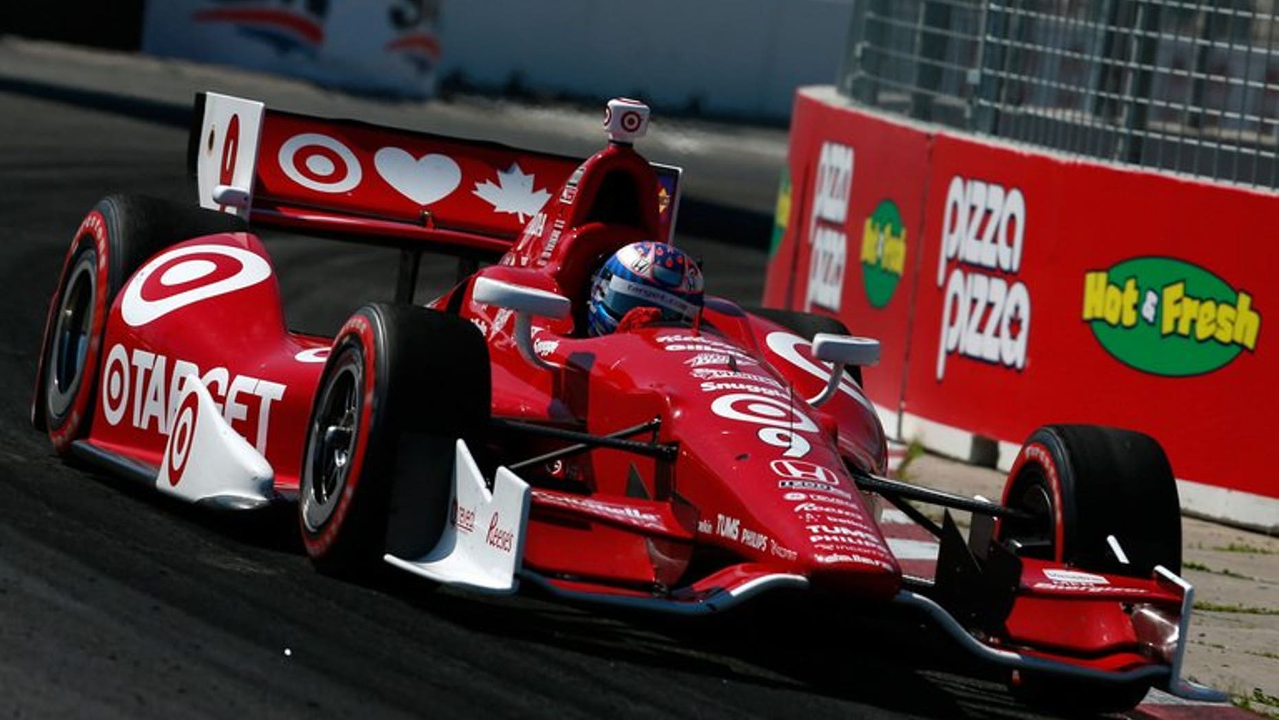 Scott Dixon of New Zealand drives the Target Chip Ganassi Racing Honda during the IZOD INDYCAR Series Honda Indy Toronto Race 1 on July 13, 2013 in Toronto, Canada. Dixon held off Sebastien Bourdais to capture the first race of the weekend doubleheader in Toronto.