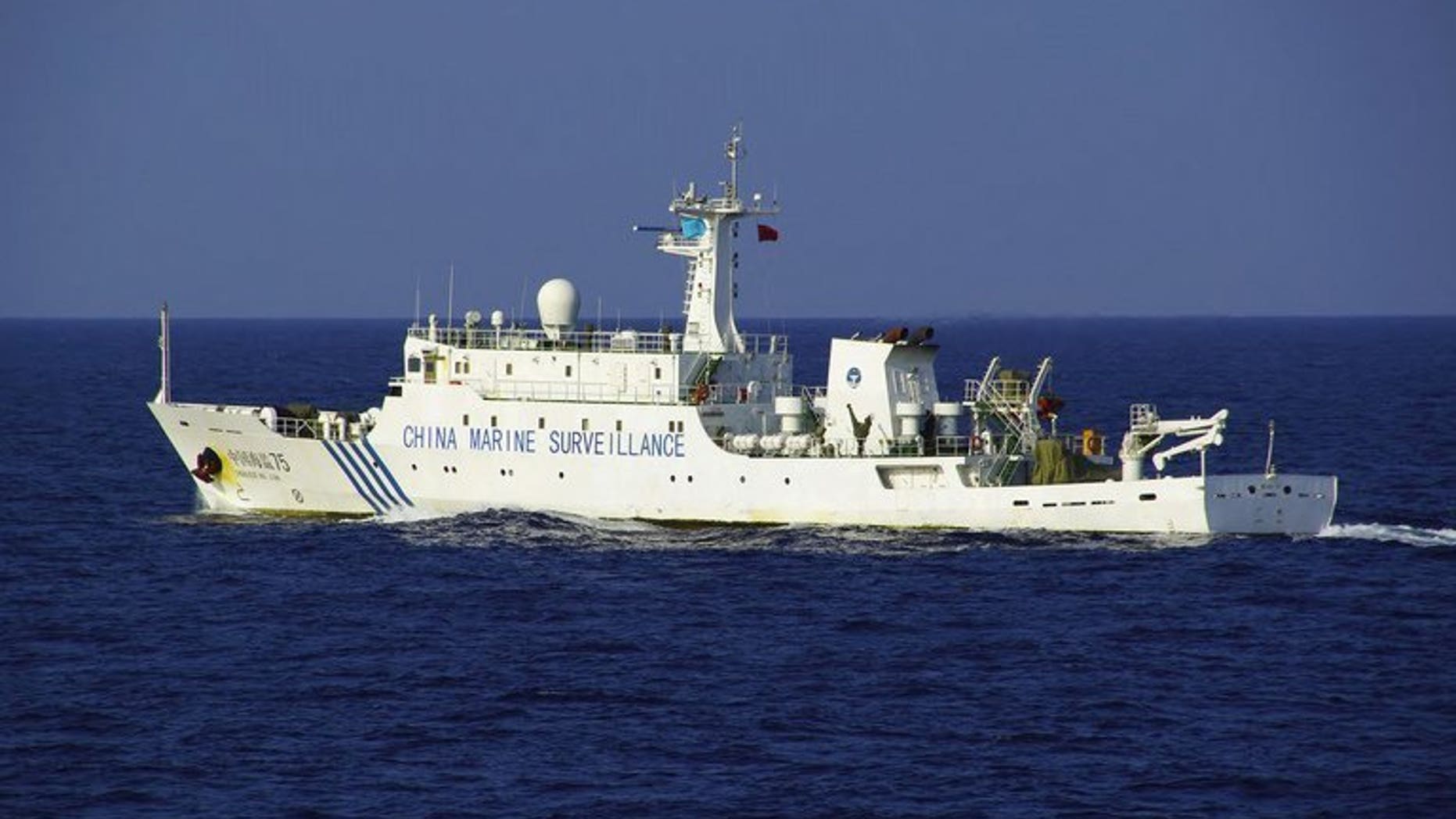 A Chinese maritime surveillance ship sails near a group of disputed islands in the East China Sea, October 25, 2012. A Chinese naval fleet has been spotted sailing for the first time through an international strait between northern Japan and Russia's far east, according to the Japanese defence ministry.