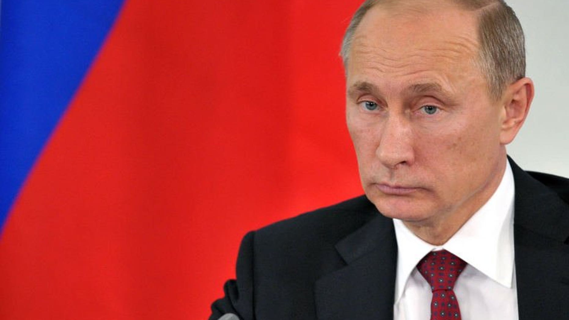 Russian President Vladimir Putin attends a press conference in Prokhorovka, on July 12, 2013. Putin has said US intelligence leaker Edward Snowden -- who has been stuck in a Moscow airport for three weeks -- would leave Russia as soon as he is able.