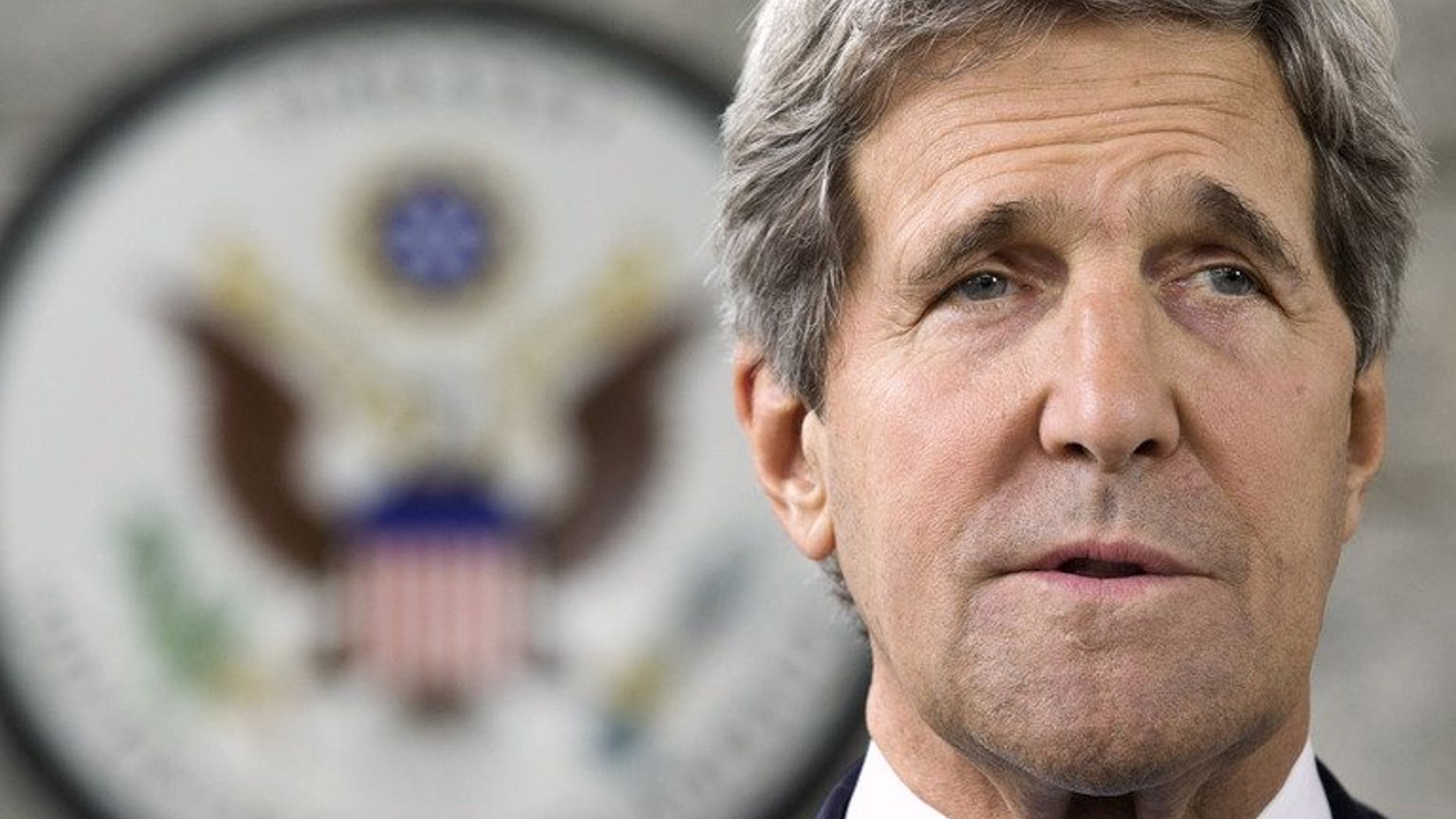US Secretary of State John Kerry makes a statement to the press at the US Embassy in Bandar Seri Begawan on July 2, 2013. Kerry will return to the Middle East this week to push for Israel-Palestinian peace talks and will meet Mahmud Abbas.