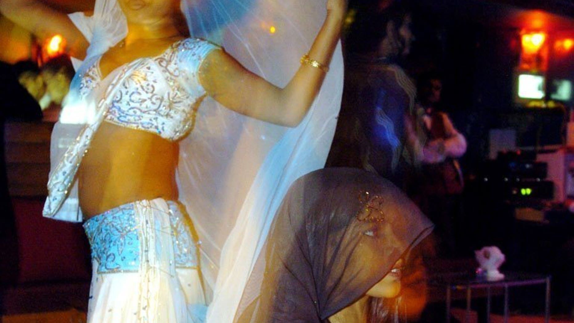 File picture shows bar dancers performing during their evening show in Mumbai, on May 6, 2005. India's top court on Tuesday overturned a ban on dance bars in the city of Mumbai, allowing hundreds of premises which employed women to dance and entertain customers to reopen.
