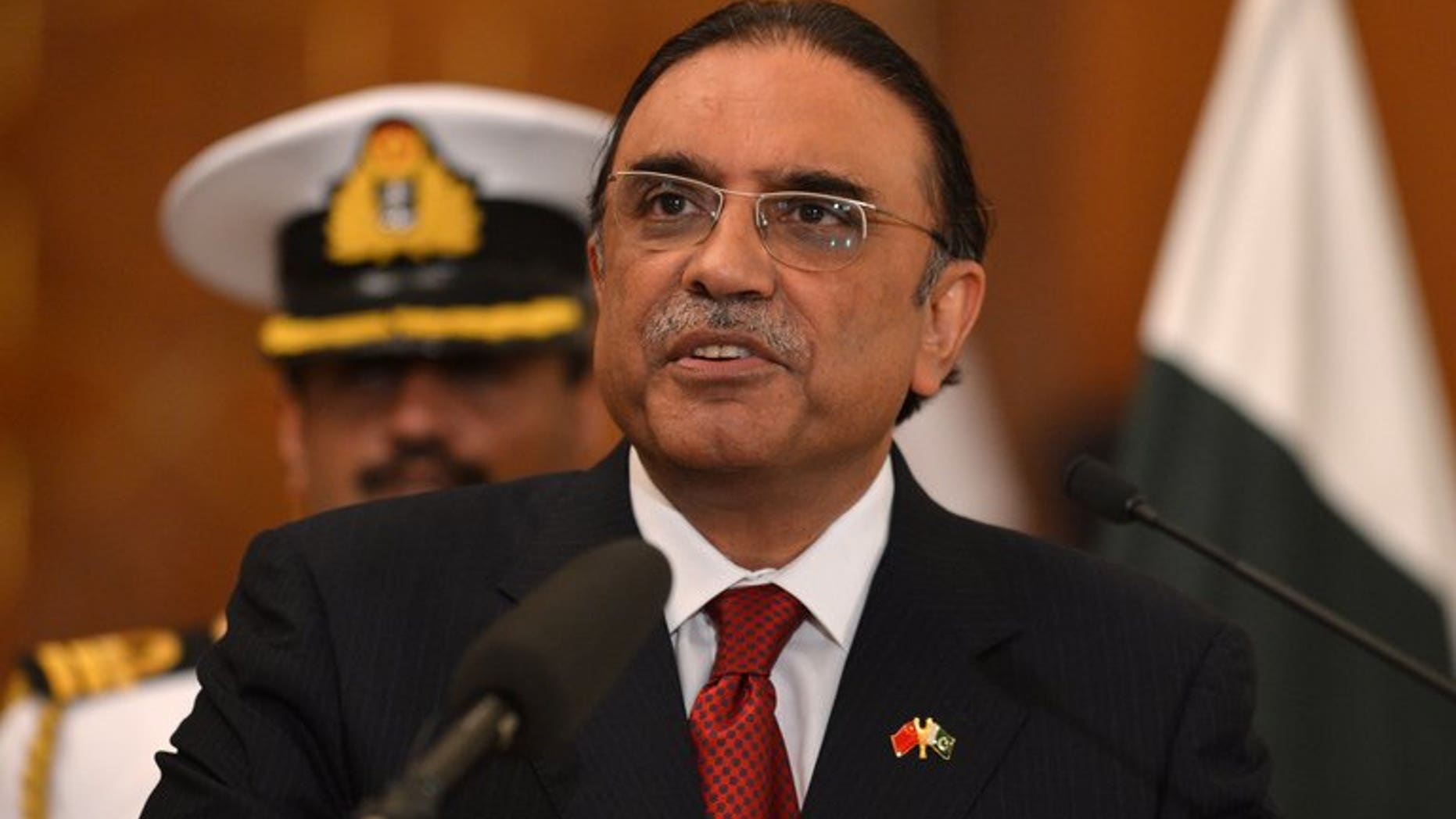 Pakistani President Asif Ali Zardari speaks during a joint press conference with unseen Chinese Premier Li Keqiang at the presidential palace in Islamabad on May 22, 2013. Pakistan's lawmakers will elect a new president on August 6, the election commission said Tuesday, to replace Asif Ali Zardari who will not stand for a second term.