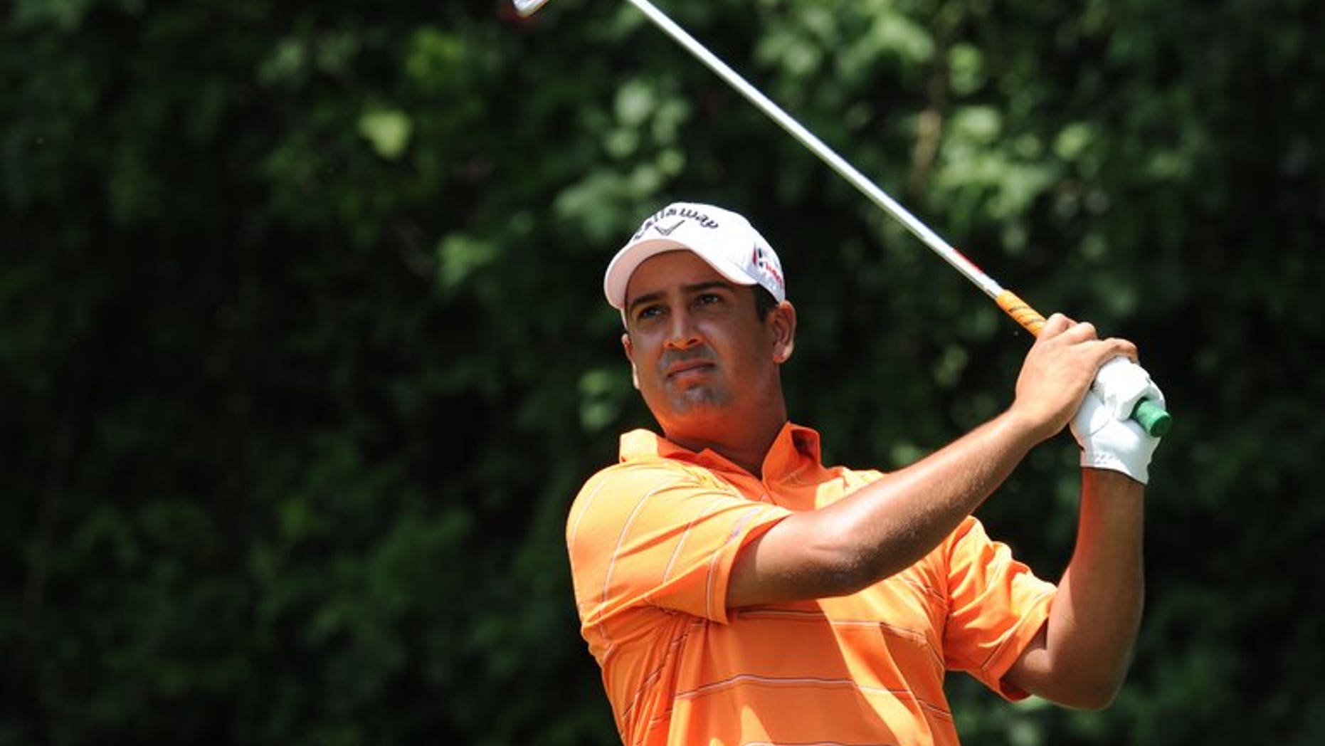 India's Shiv Kapur plays a shot during the Panasonic Open at the Delhi Golf Club on April 7, 2013. Kapur believes that he is more prepared for his British Open challenge after receiving valuable advice from Muirfield expert and six-time major champion Nick Faldo.