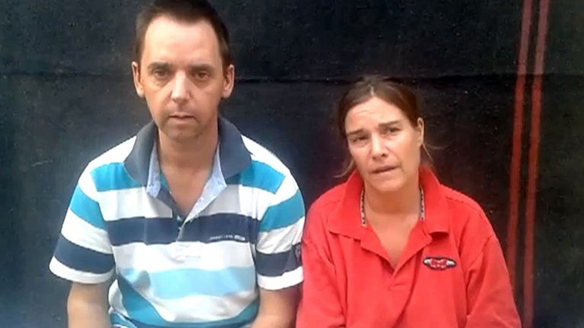 An image grabbed from a video dated July 13, 2013 and posted on YouTube and Facebook on July 16, 2013 shows Dutch nationals Judith Spiegel and her partner Boudewijn Berendsen speaking at an undisclosed location.