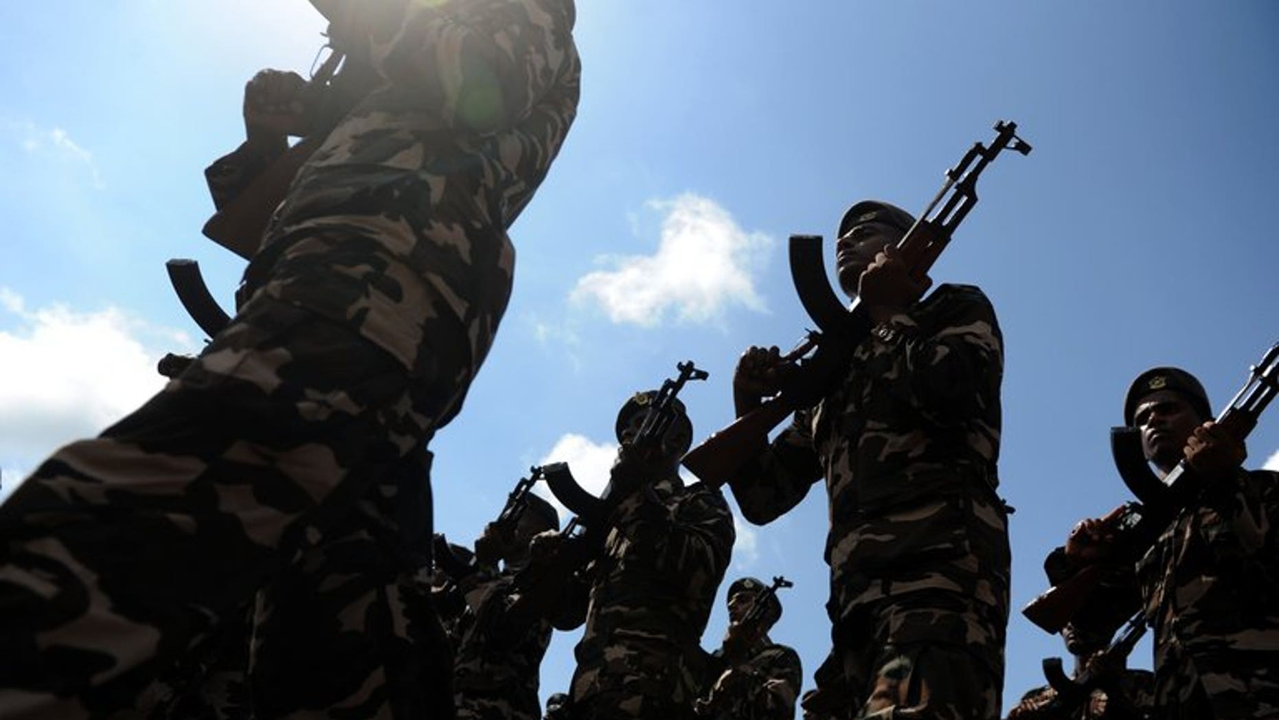 Sri Lankan Air Force Regiment soldiers march during a Victory Day parade rehearsal in Colombo on May 15, 2012. Britain has issued export licences worth ??12 billion ($18 billion, 14 billion euros) for the sale of military equipment to states deemed possible rights violators including Syria, Iran and China, and Sri Lanka, MPs said.