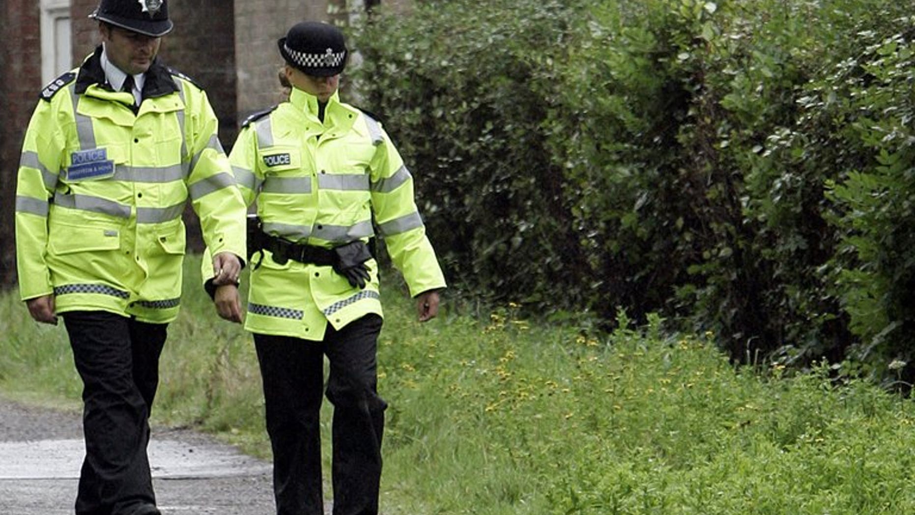 Police patrol in east Sussex, in southern England, on September 3, 2006. British police on Wednesday said they had found the body of an actor who appeared in James Bond film "Casino Royal", who went missing in London last Wednesday.