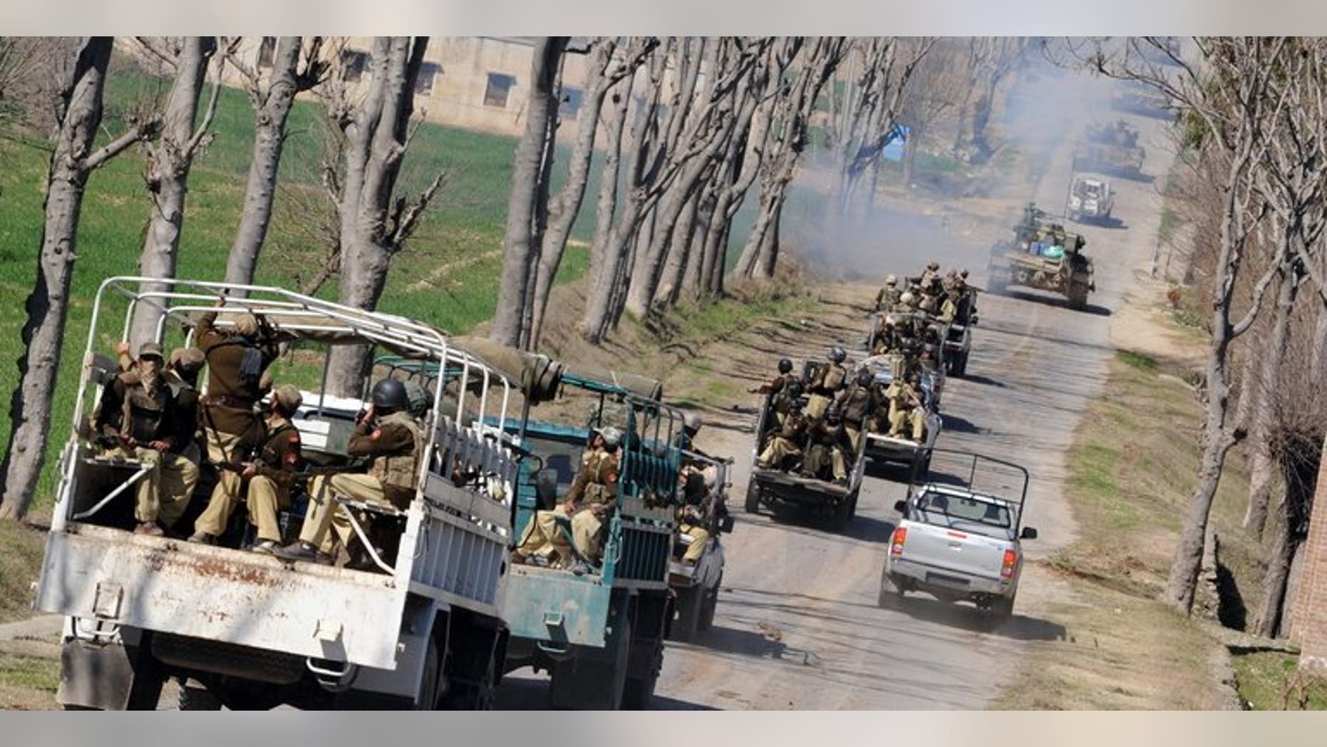 Pakistani paramilitary soldiers patrol in the remote Bajaur Agency on February 28, 2009. Gunmen ambushed a vehicle carrying government paramilitary forces in a restive Pakistani tribal region near the Afghan border on Thursday, killing two soldiers, officials said.