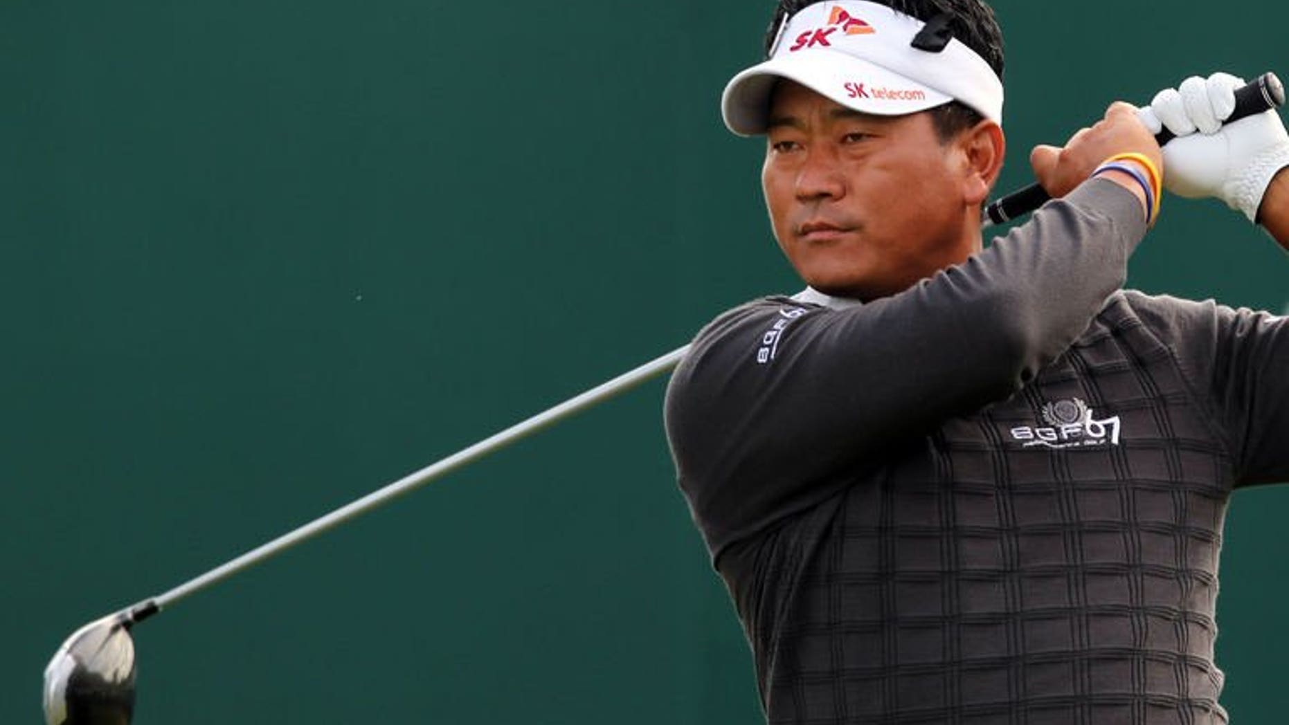 South Korea's KJ Choi tees off on the first hole during the first round of the British Open at Muirfield golf course at Gullane in Scotland, on July 18, 2013.