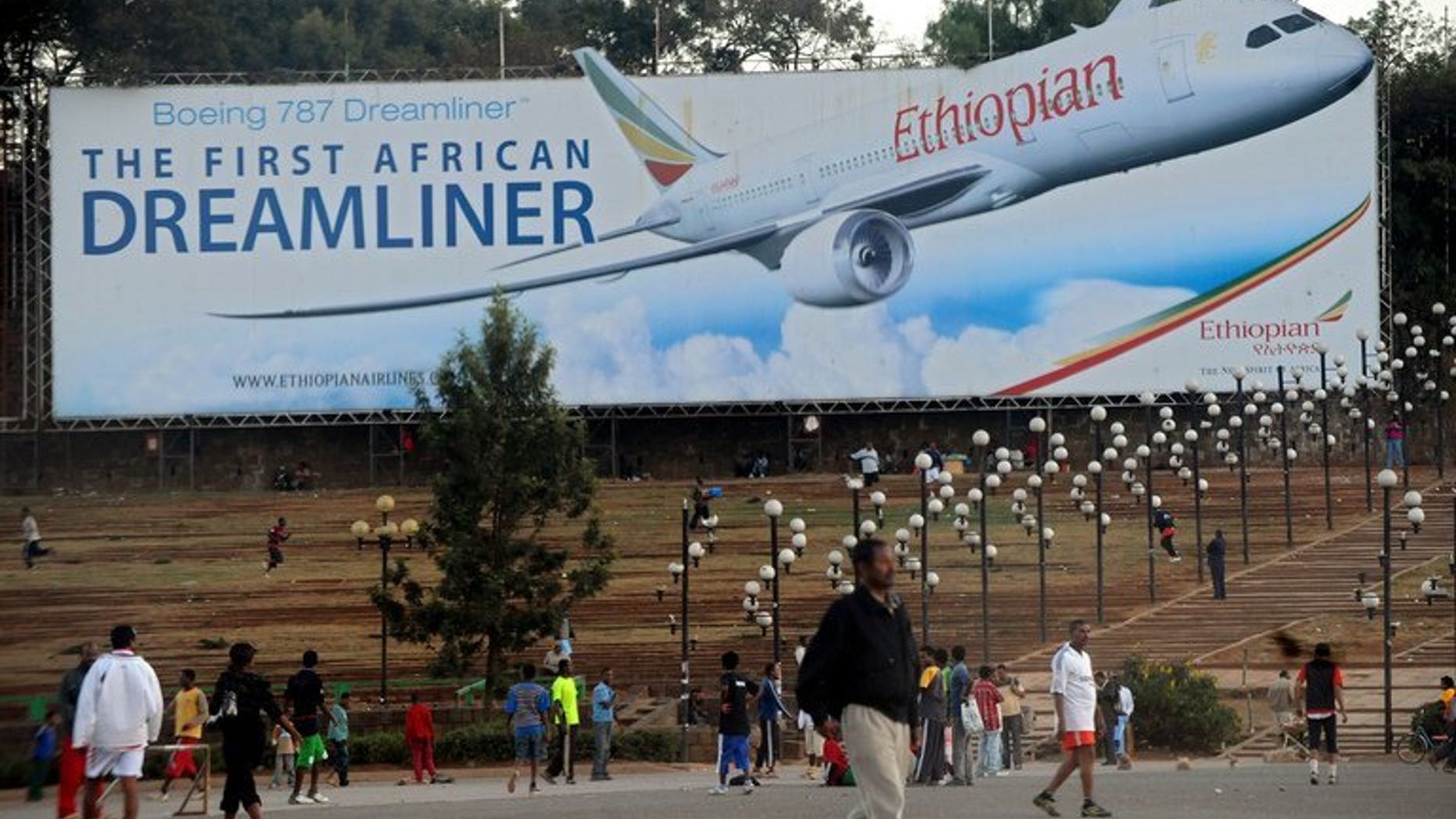 A billboard in Addis Ababa shows an Ethiopian Airlines Boeing 787 Dreamliner plane. British authorities probing a fire onboard a parked Boeing Dreamliner at London's Heathrow airport recommended on Thursday that Honeywell distress beacons on all 787 planes be deactivated pending further checks.