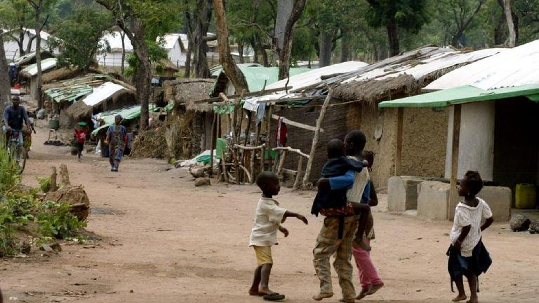 A Kuntaya refugee camp on May 5, 2002, some 760 kilometres southeast of Conakry. Volunteers continued the grim task of collecting bodies from the streets in southern Guinea on Thursday after ethnic clashes which left dozens burned alive or hacked to death with machetes.
