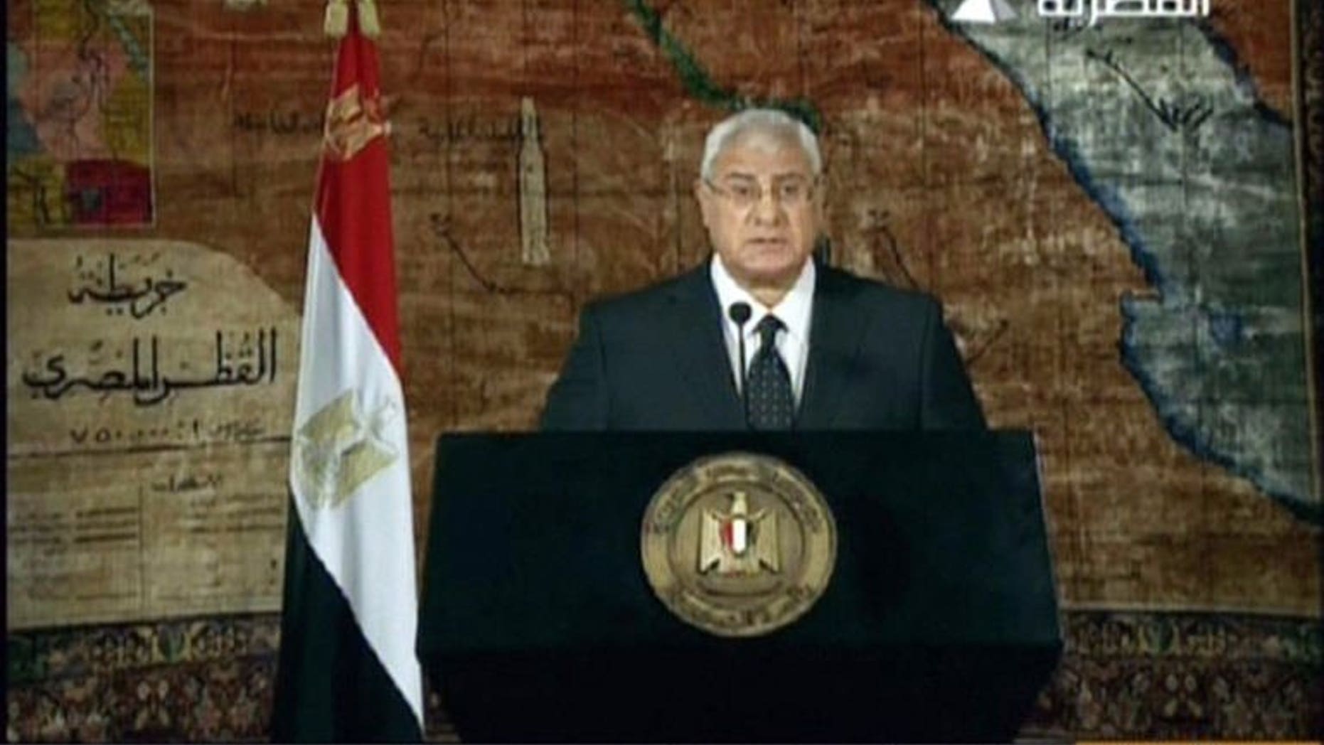 An image grab taken from Egyptian state TV shows Egypt's interim president Adly Mansour delivering his first televised address to the nation since his inauguration, on July 18, 2013 in Cairo. Mansour vowed on Thursday to battle for security "to the end", as Islamists promised new protests against his army-installed interim government.