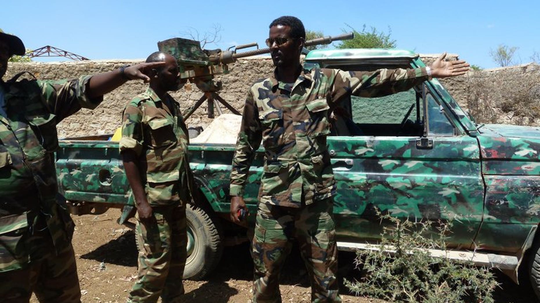 Ethiopian troops patroll at the entrance of an abandoned building in Baidoa, on March 2, 2012. Ethiopian troops who entered Somalia in November 2011 to help fight Al-Qaeda linked Shebab insurgents have begun their withdrawal from the key central city of Baidoa, the foreign ministry said Thursday.