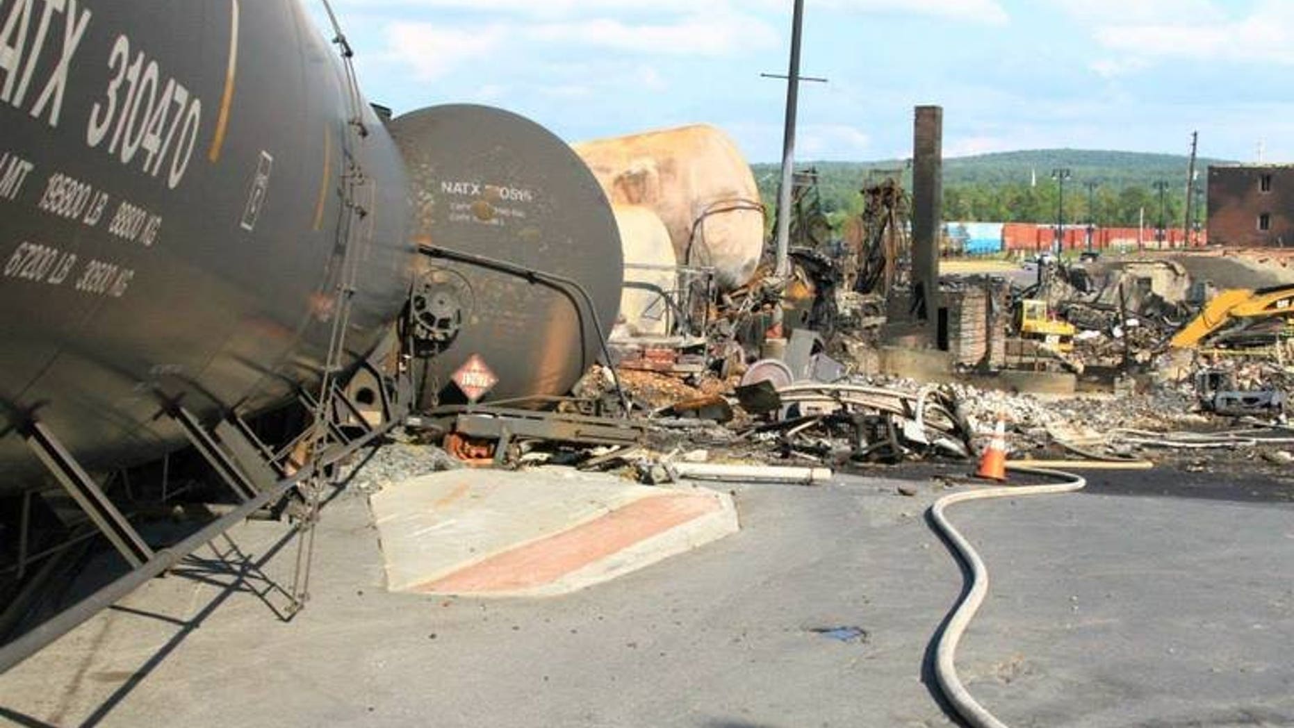 This undated picture released by Quebec police (Surete du Quebec) on July 12, 2013 shows derailed train wagons in Lac-Megantic following the derailment and explosion of a train loaded with crude oil on July 6. Police announced Thursday they had found four more bodies amid the ruins of Lac-Megantic, bringing the body count to 42.