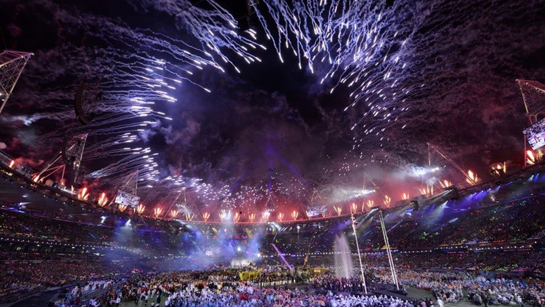 Fireworks light up the sky above the Olympic Stadium during the closing ceremony of the London 2012 Paralympic Games, on September 9, 2012. The Olympic Games in London last year gave the British economy a boost worth $15 billion, the government said on Friday, a figure far higher than the cost of staging the event.