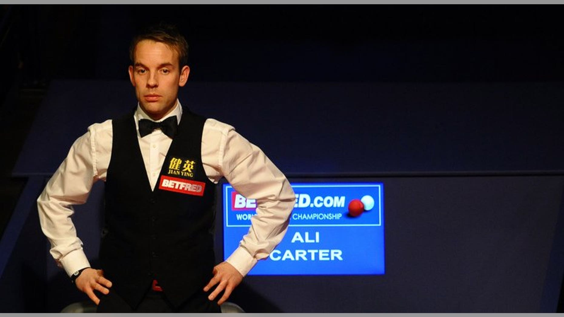 Ali Carter of England watches on May 7, 2012 during the third session of the World Championship Snooker final at the Crucible Theater in Sheffield, England. Carter will return to action at the Shanghai Masters after being given the all-clear from testicular cancer.