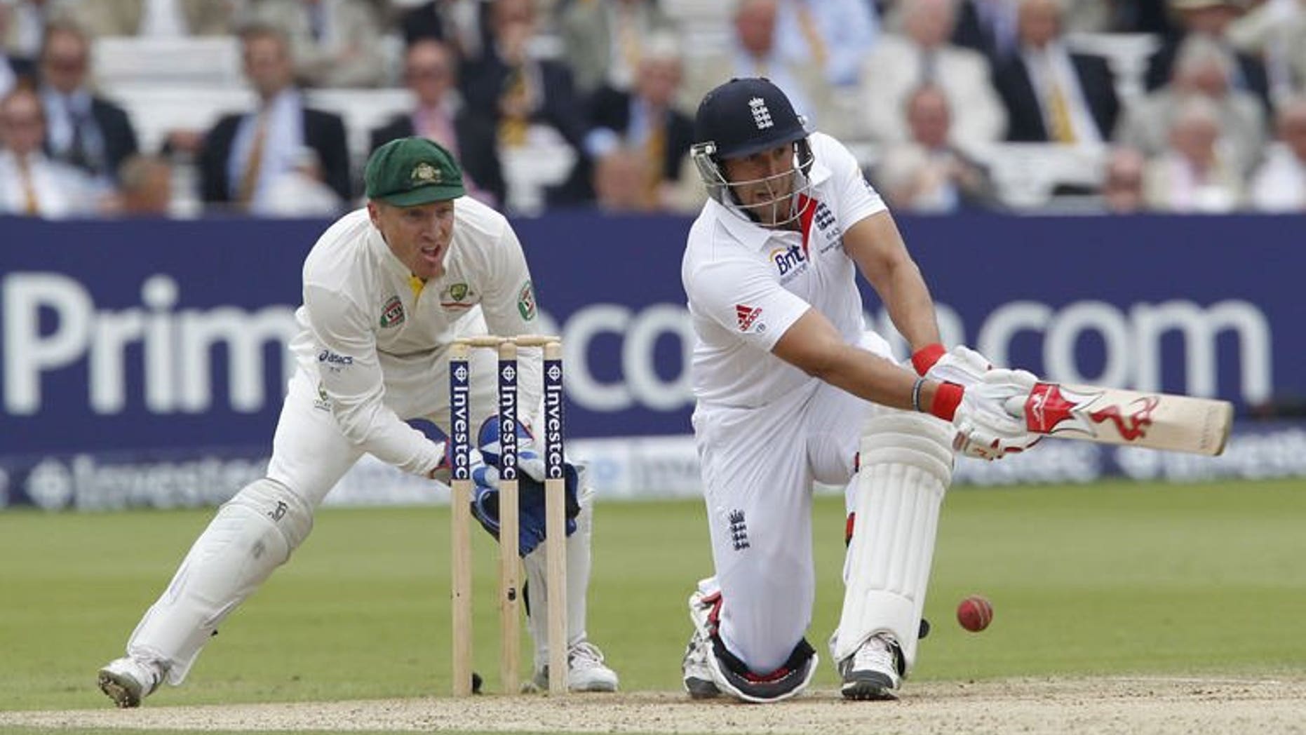 England's Tim Bresnan (right) plays a shot watched by Australia's wicketkeeper Brad Haddin during the third day of the second Ashes Test at Lord's in London, on July 20, 2013. England were 114 for three in their second innings, a lead of 347 runs, at lunch.