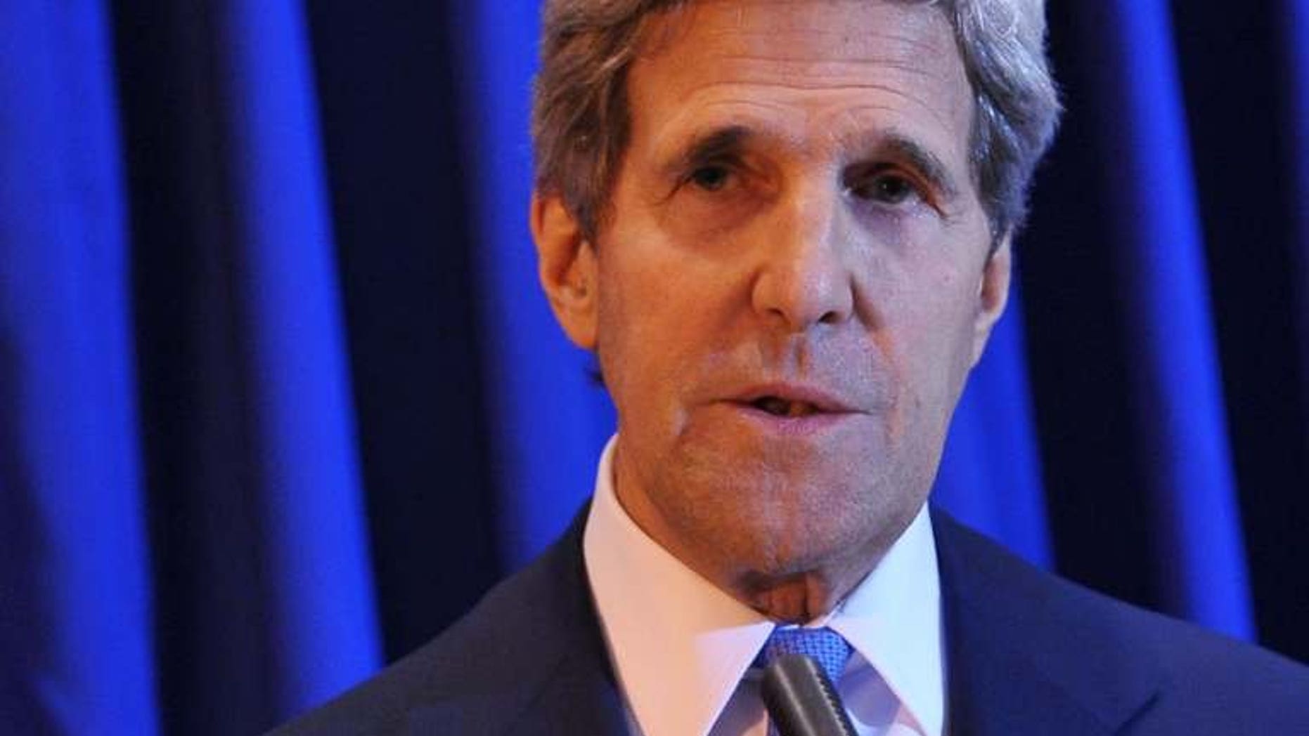 US Secretary of State John Kerry speaks during a press conference at Queen Alia International Airport on July 19, 2013 in the Jordanian capital Amman. Kerry's efforts have led to an agreement in principle to resume Israeli-Palestinian peace talks but the devil remains in the details of the negotiating terms.