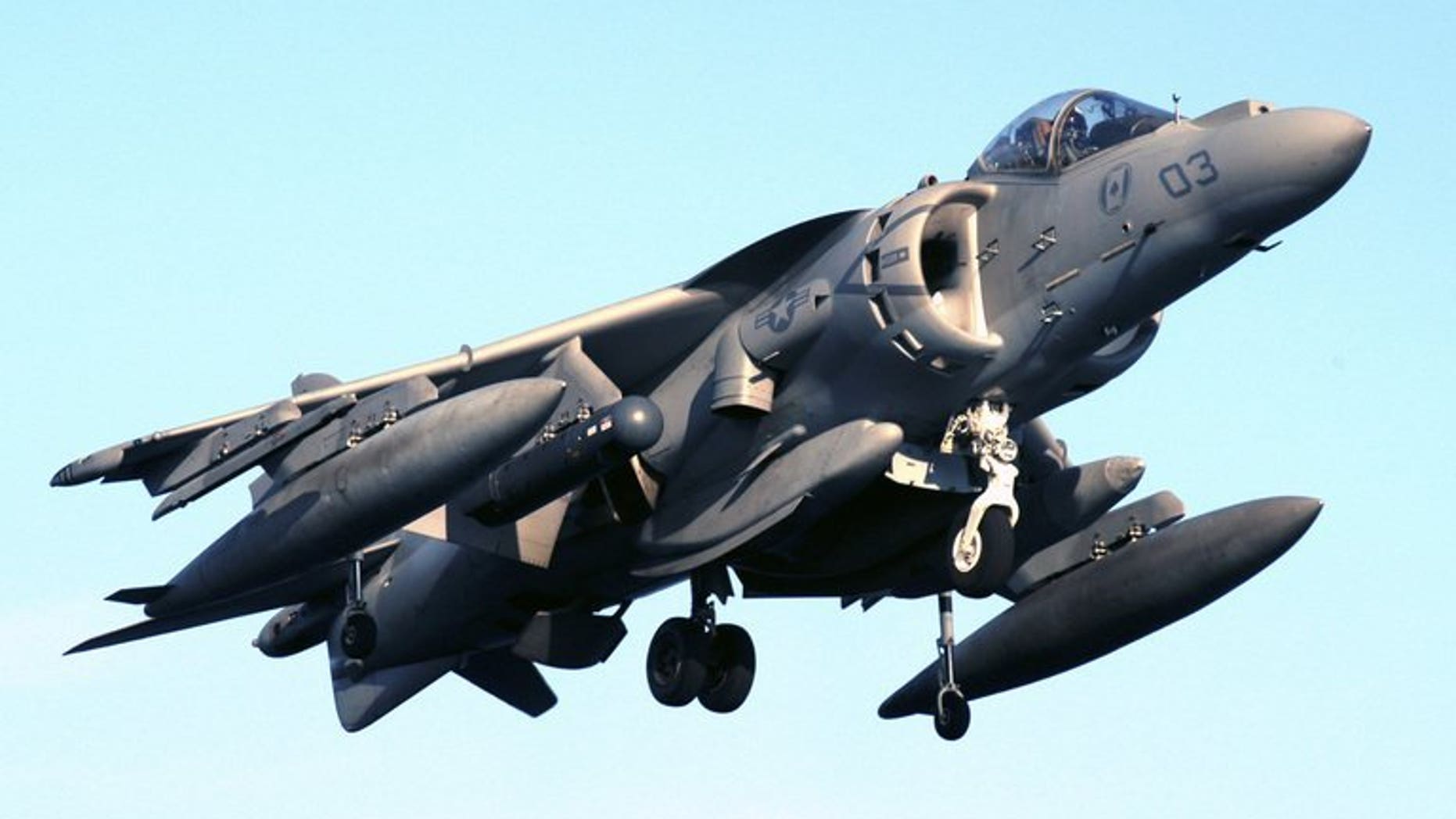 This file photo, released by US Navy, shows an AV-8B Harrier jet preparing to land on the flight deck of an amphibious assault ship. Similar jets dropped four unarmed bombs on Australia's Great Barrier Reef on July 16, 2013, in an "emergency jettison" during a training exercise, officials said, ruling out any risk to the public or environment.