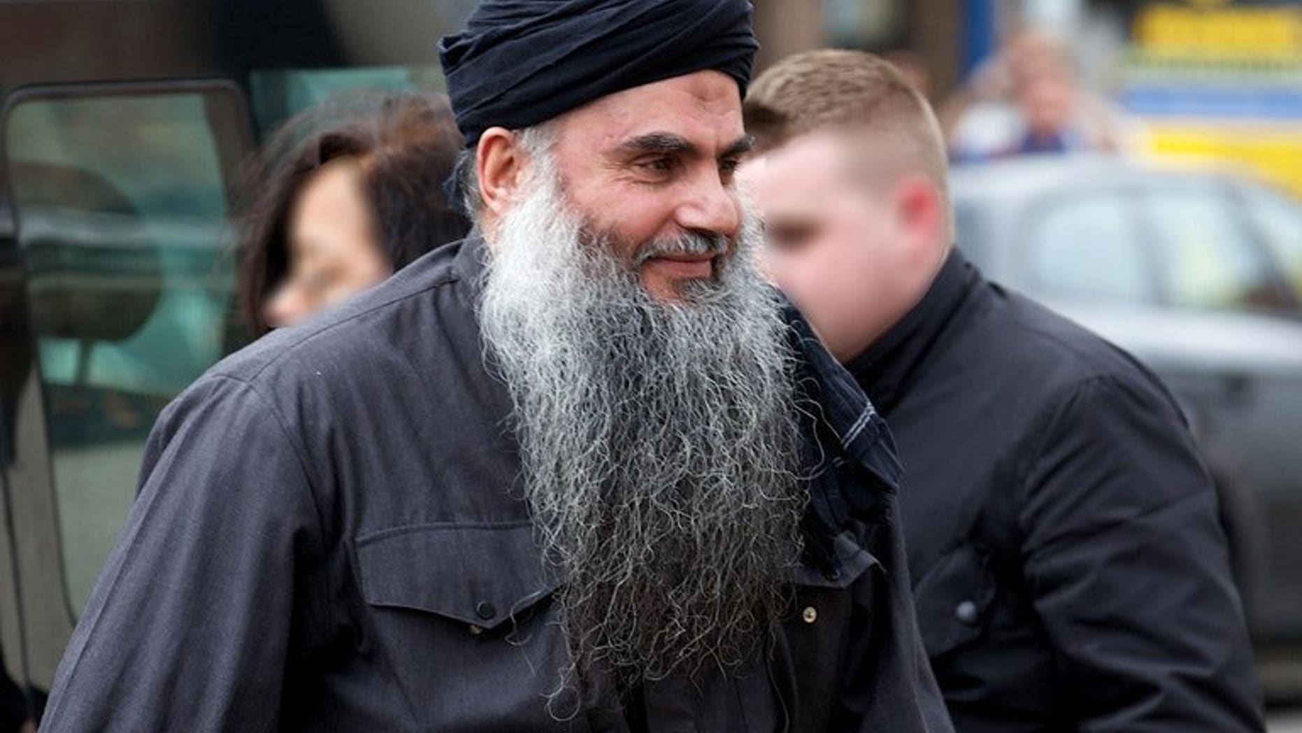 Islamist cleric Abu Qatada arrives at his home in northwest London, on November 13, 2012. A military court has rejected a bail application by Qatada, who faces terror charges in Jordan following his deportation from Britain, his lawyer tells AFP.