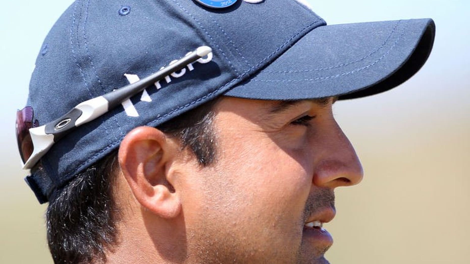 India's Shiv Kapur is pictured during the third round of the 2013 British Open Golf championship at Muirfield golf course in Scotland on July 20, 2013. The golfer will take away bittersweet memories from the tournament after ending his campaign with an even-par 71.
