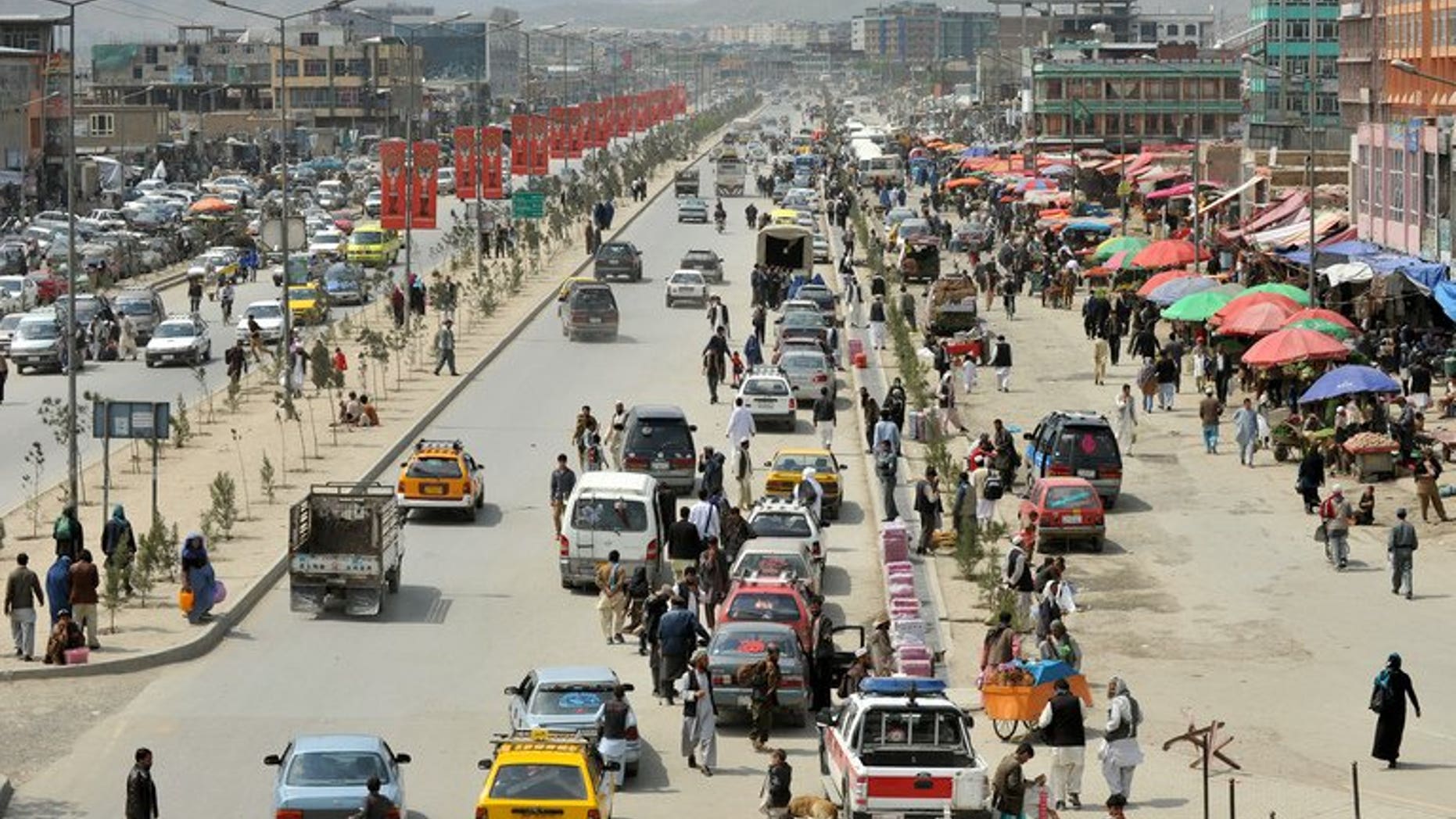 Traffic is seen on a street in the Afghan capital Kabul on April 22, 2013. The Afghan government has unveiled a new package of incentives to attract desperately needed investment to the war-torn country before NATO withdraws next year.