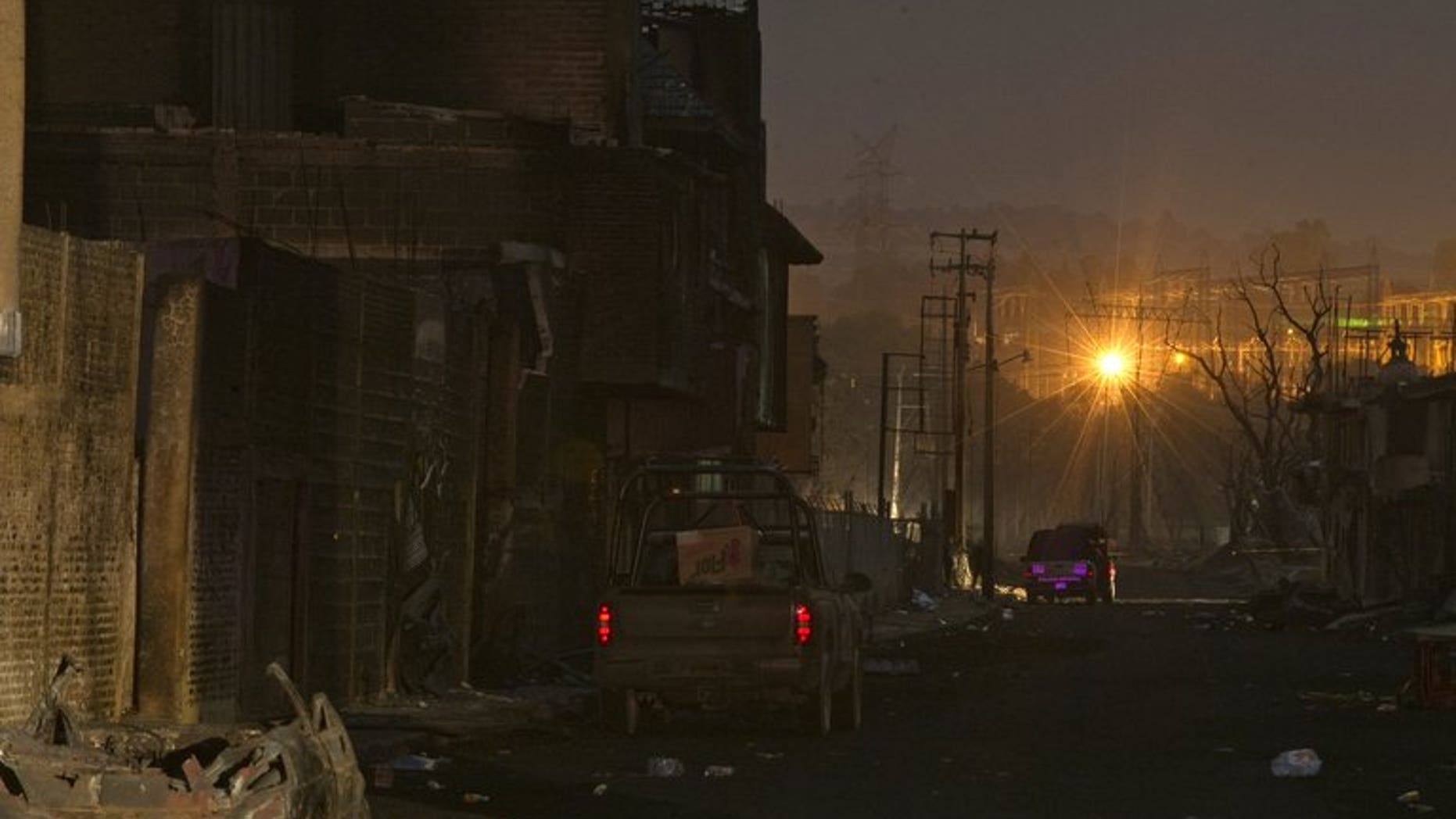 The site of an explosion of a Pemex pipeline in Texmelucan, Puebla state, is pictured on December 19, 2010. An oil pipeline exploded in a rural area of central Mexico early Sunday, igniting a huge blaze that injured seven people, authorities said.