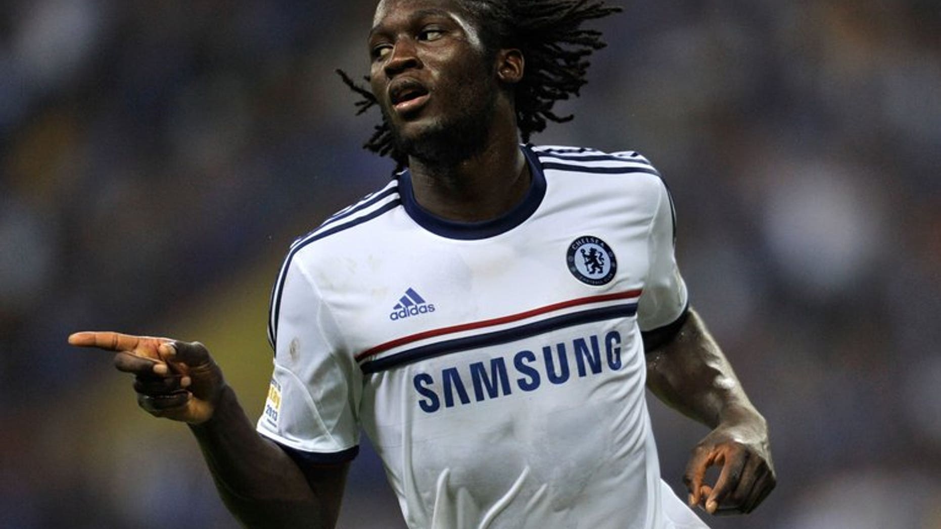 Chelsea's Romelu Lukaku celebrates after scoring Chelsea's third goal against Malaysia during their friendly football match at the Shah Alam Stadium in Shah Alam, near Kuala Lumpur on July 21, 2013. Chelsea won 4-1.