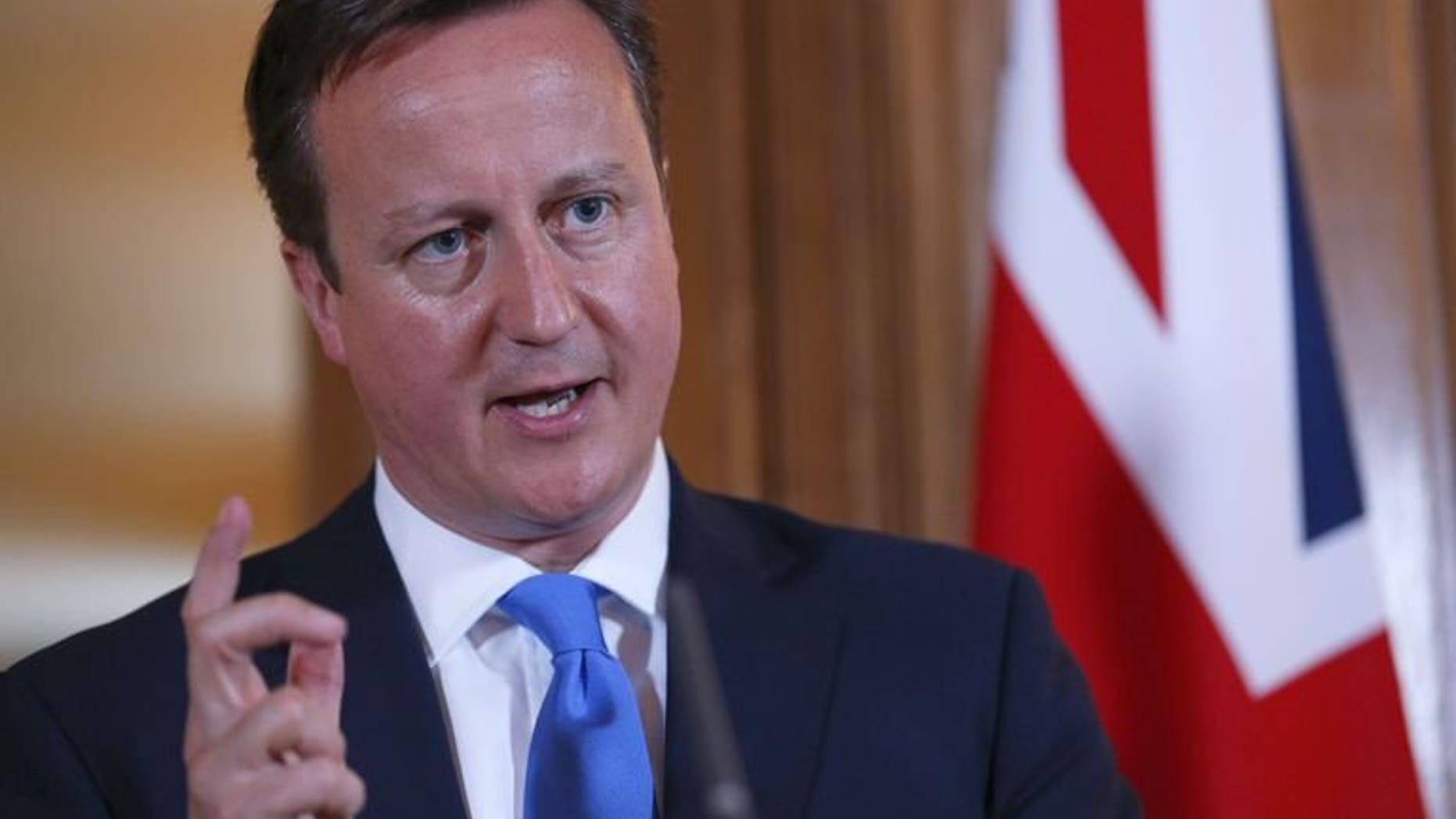 Britain's Prime Minister David Cameron speaks in London on July 17, 2013. Cameron will on Monday demand Internet search engines take action to block queries about child sex abuse, threatening legislation if they fail to comply.
