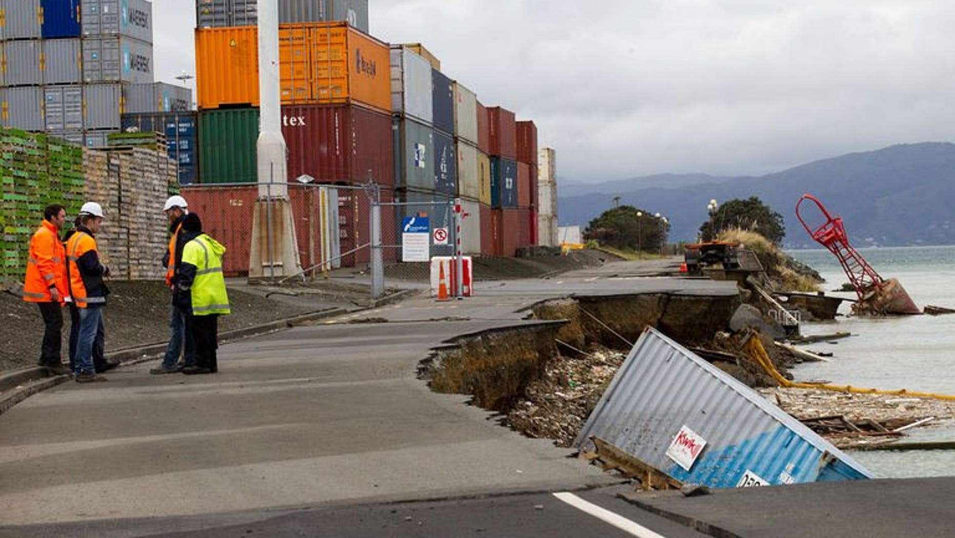 An empty shipping container sits in the harbour where the land fell into the sea at the Port Wellington Container terminal caused by yesterdays earthquake on July 22, 2013.