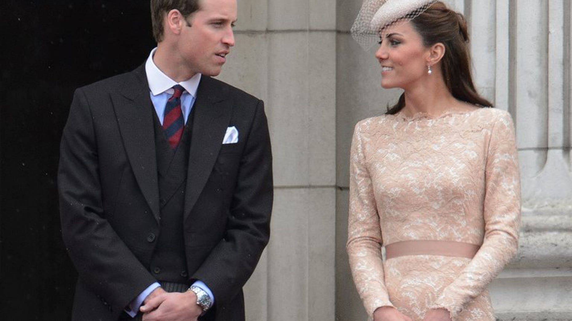 Prince William (L) and his wife Catherine, seen on the balcony of Buckingham Palace on June 5, 2012.