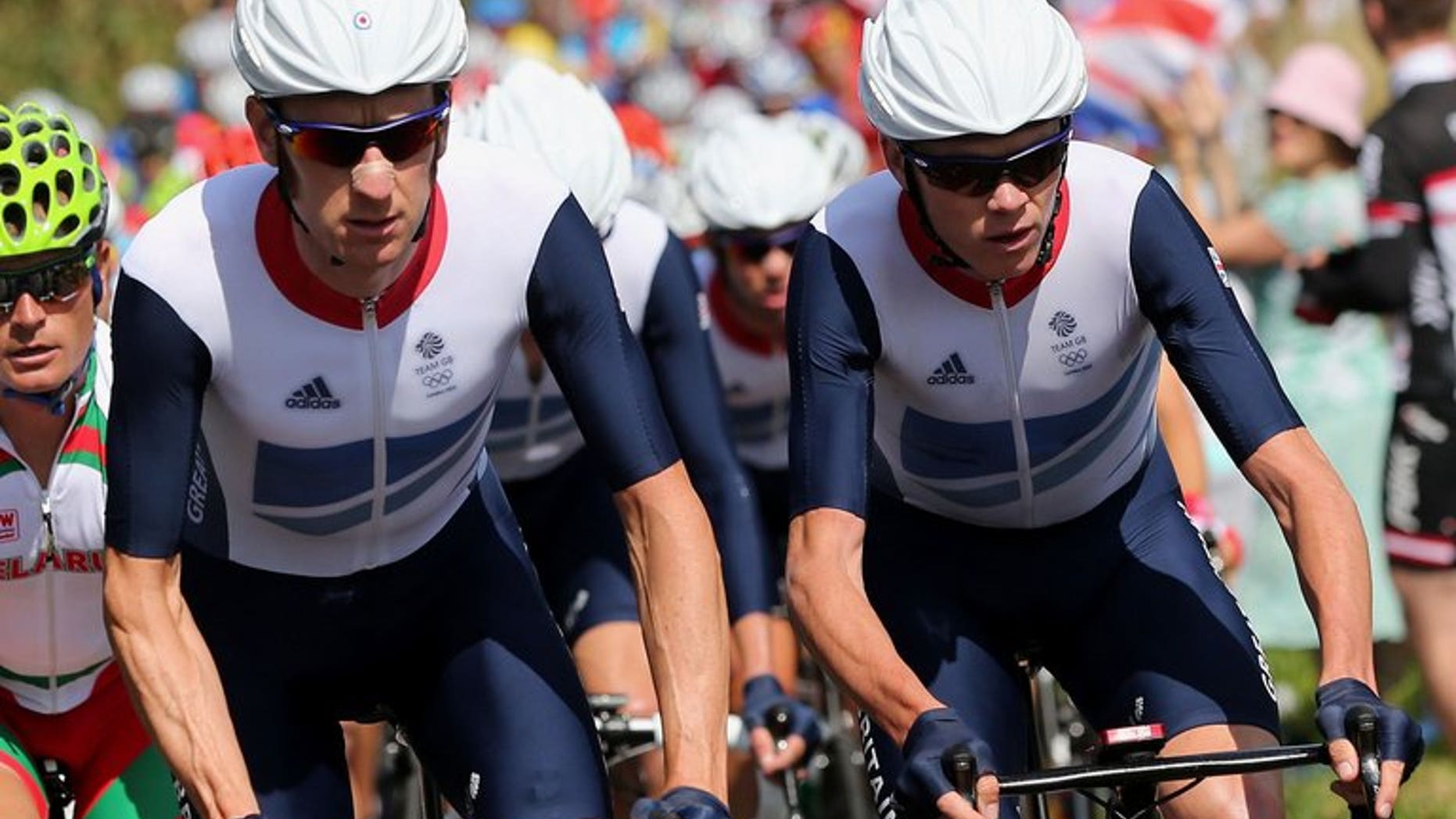 Bradley Wiggins (L) rides next to Chris Froome (R) in the London 2012 Olympic Games on July 28, 2012. Team Sky boss Dave Brailsford would love to see Froome and Wiggins, the last two Tour de France winners, lining up together when the race heads to Britain next year.